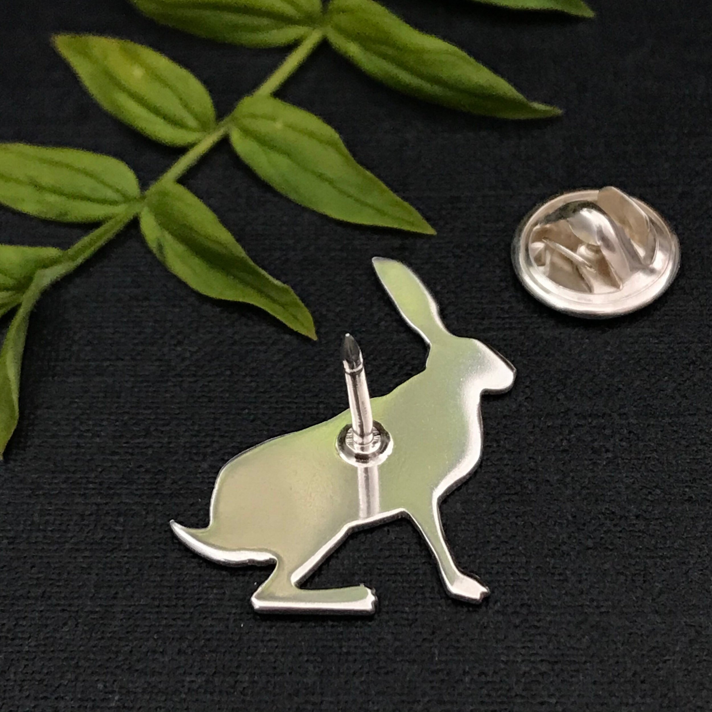Back of sitting Hare lapel pin.