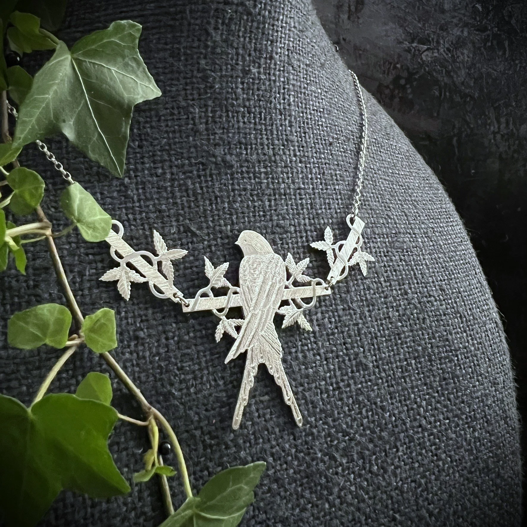 SWALLOW RESTING NECKLACE.JPEG