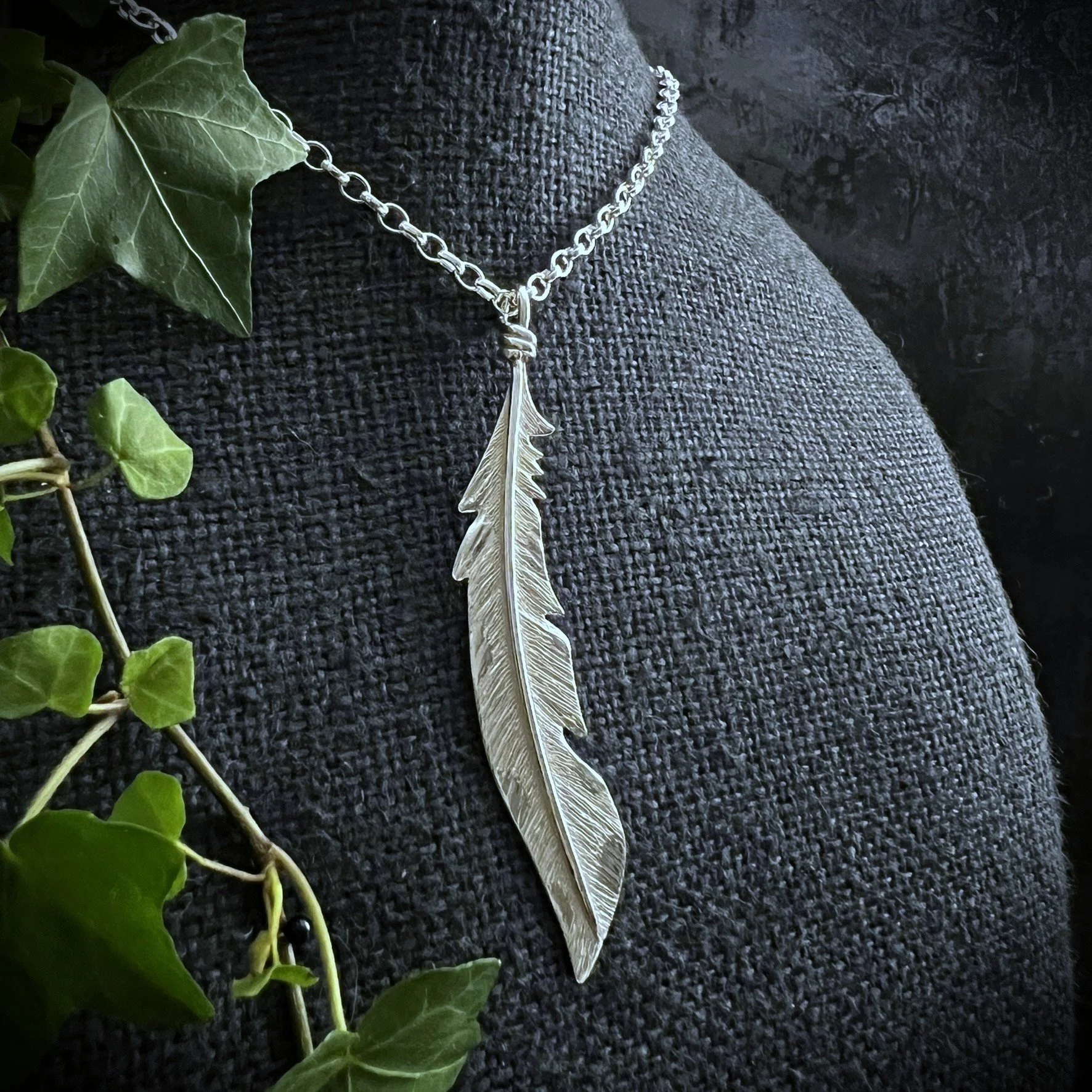 WOOD-PECKER FEATHER NECKLACE.JPEG