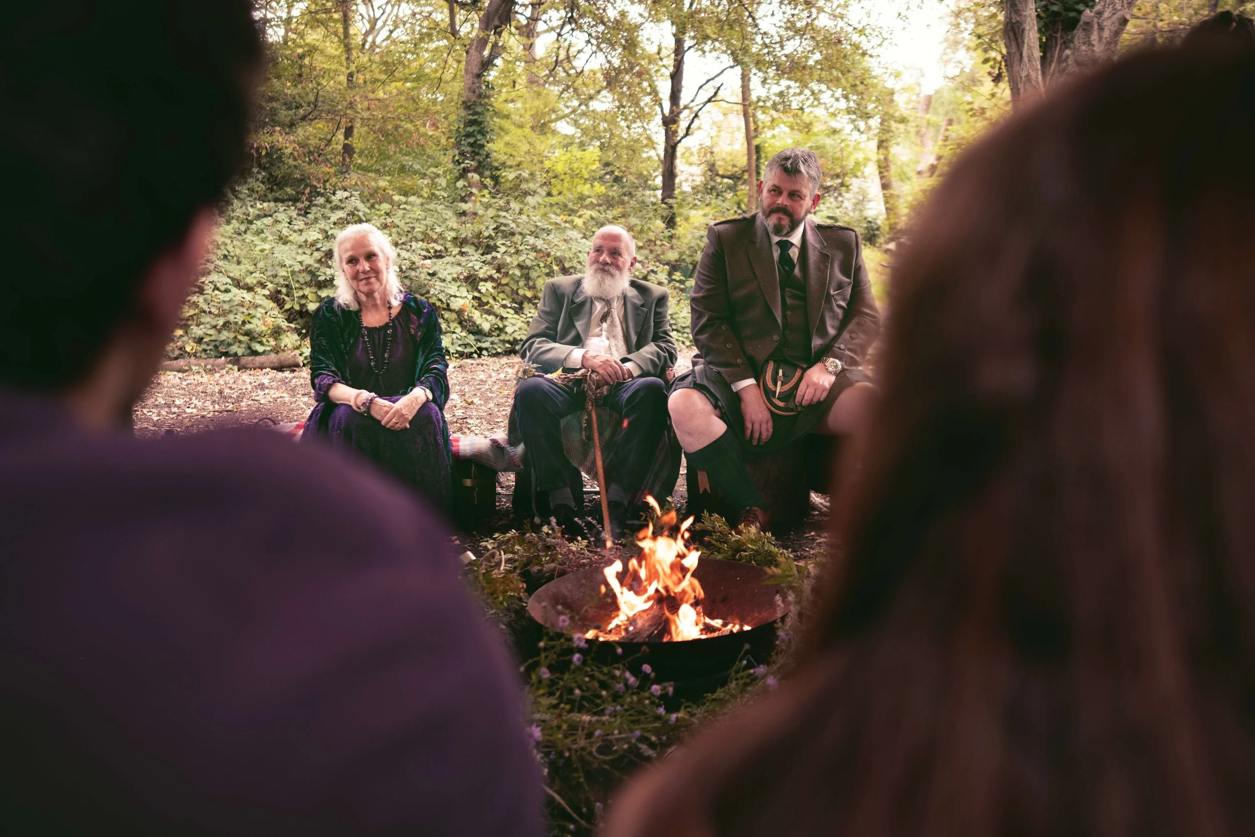 Pagan hand fasting guests with fire