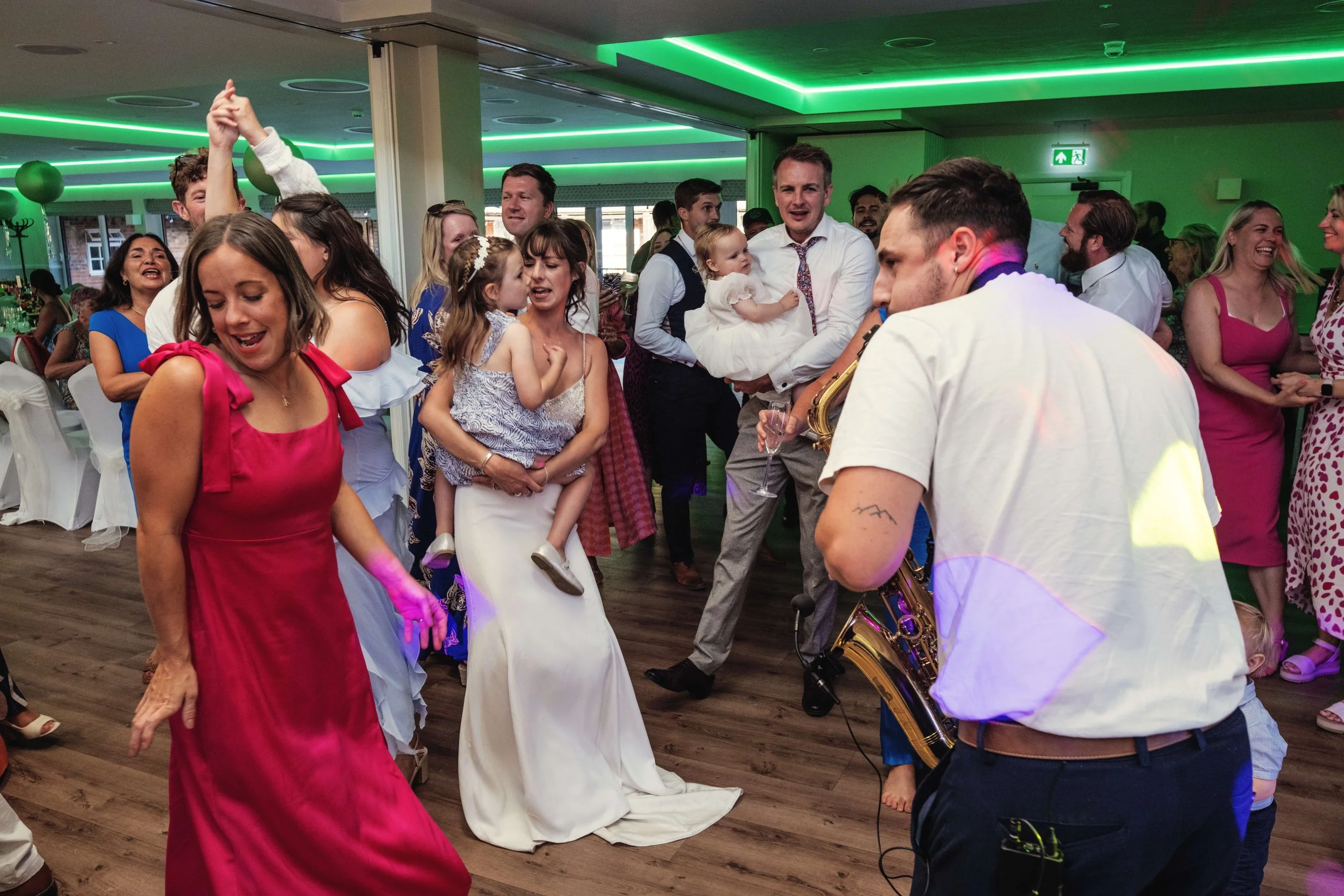 Wedding party dance with live saxophonist