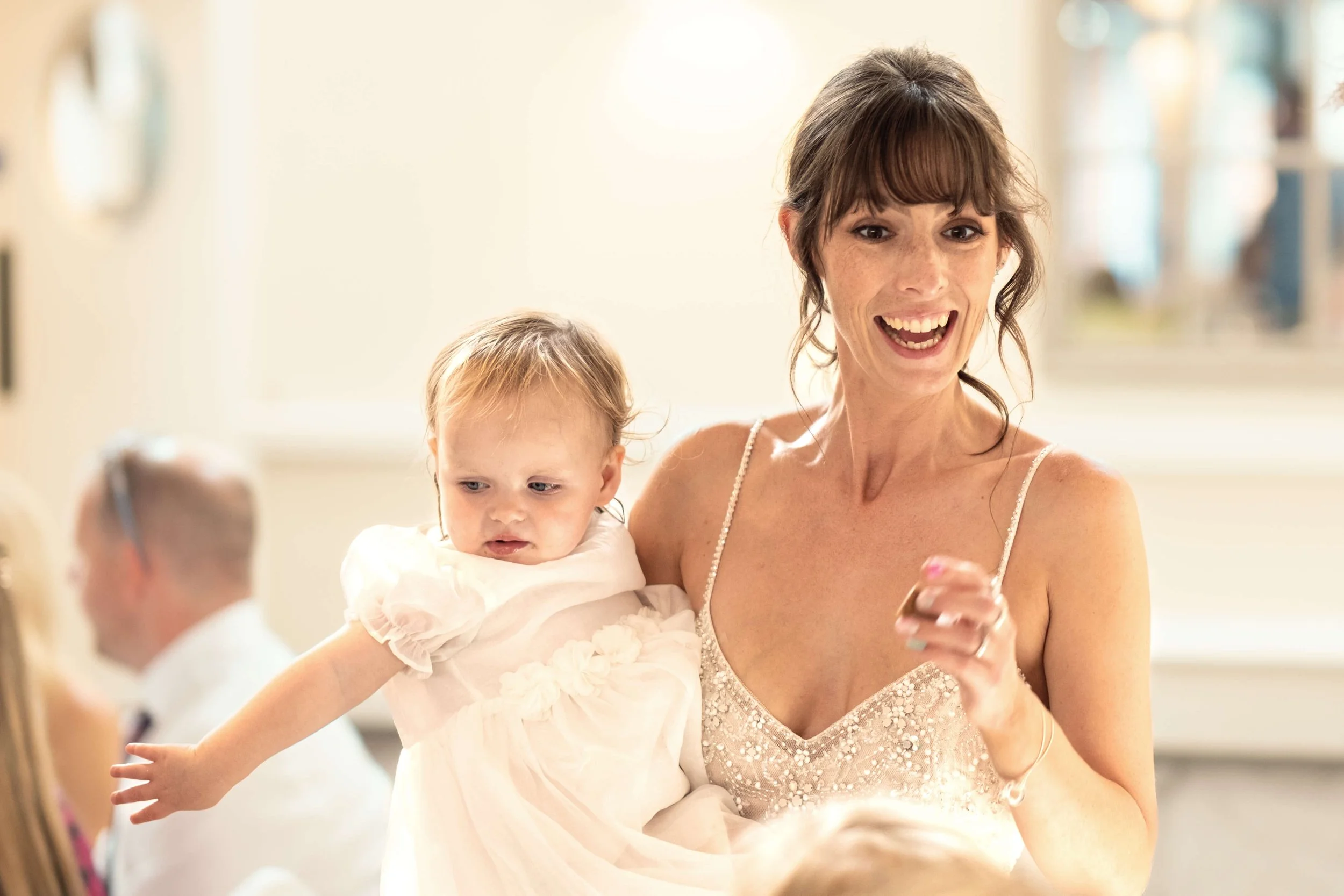 Bride with her child smiling.jpg