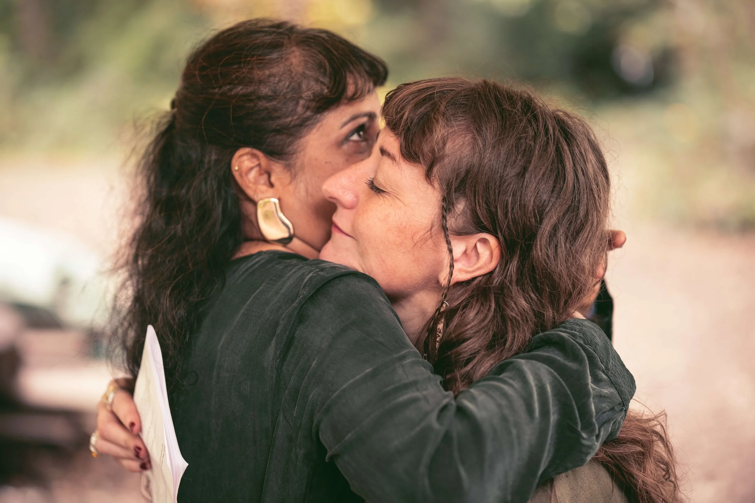 Handfasting guests embrace
