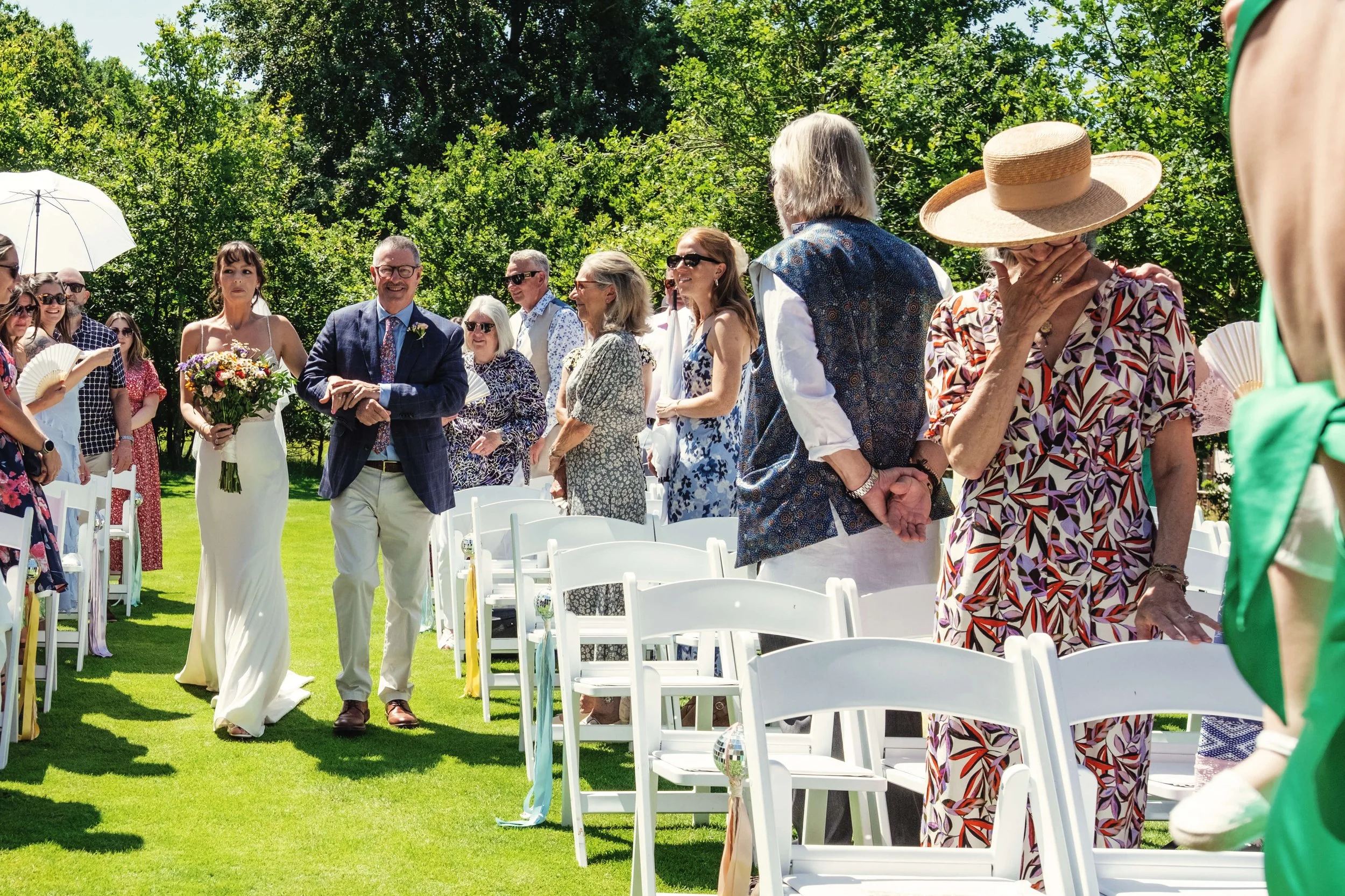 tearful mother of the bride at service.jpg