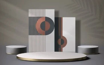 Abstract geometric art installation with vertical striped panels and circular shapes, displayed on a stage with white round stools.