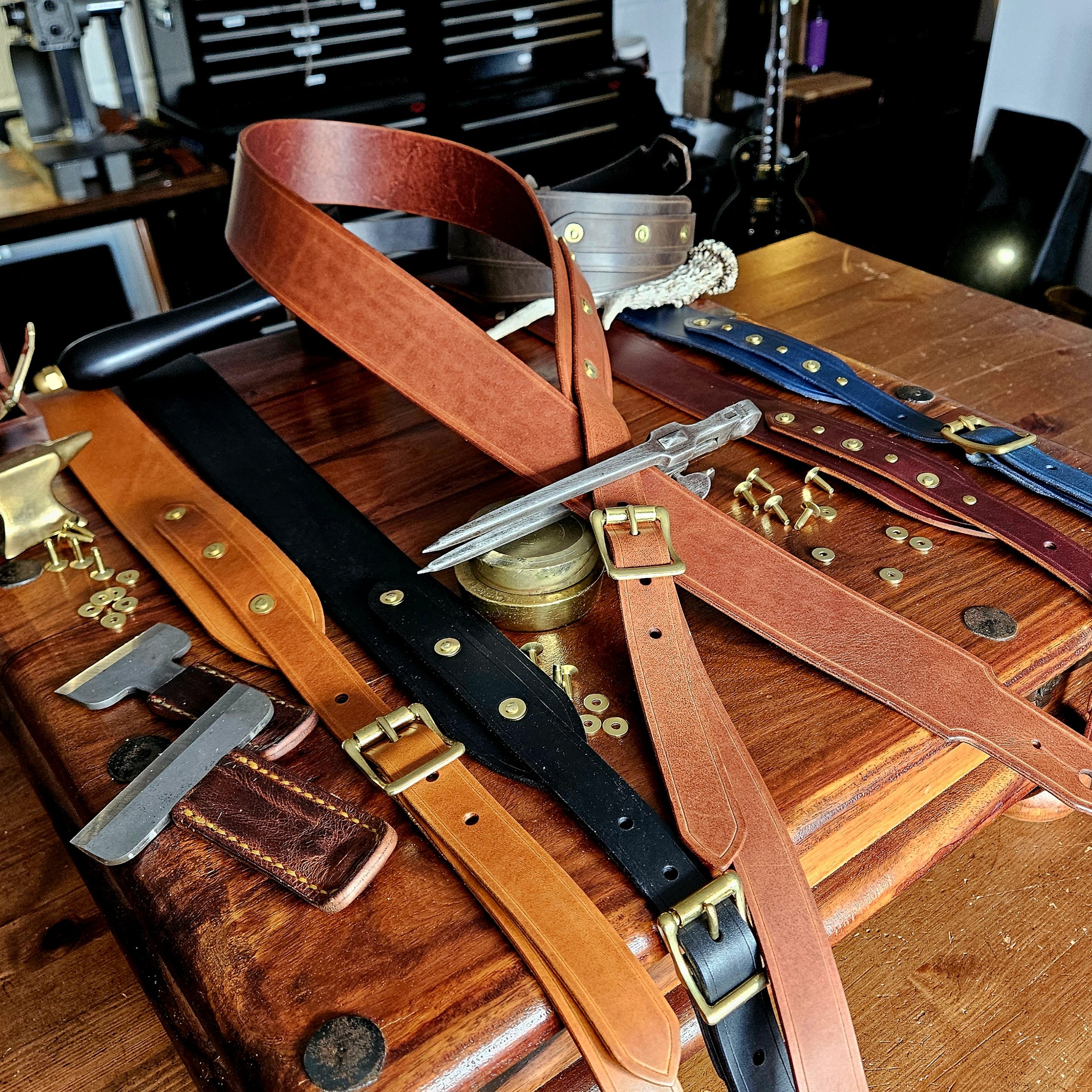 Hand made leather guitar strap. Solid Brass Buckle. Riveted. Made in UK.