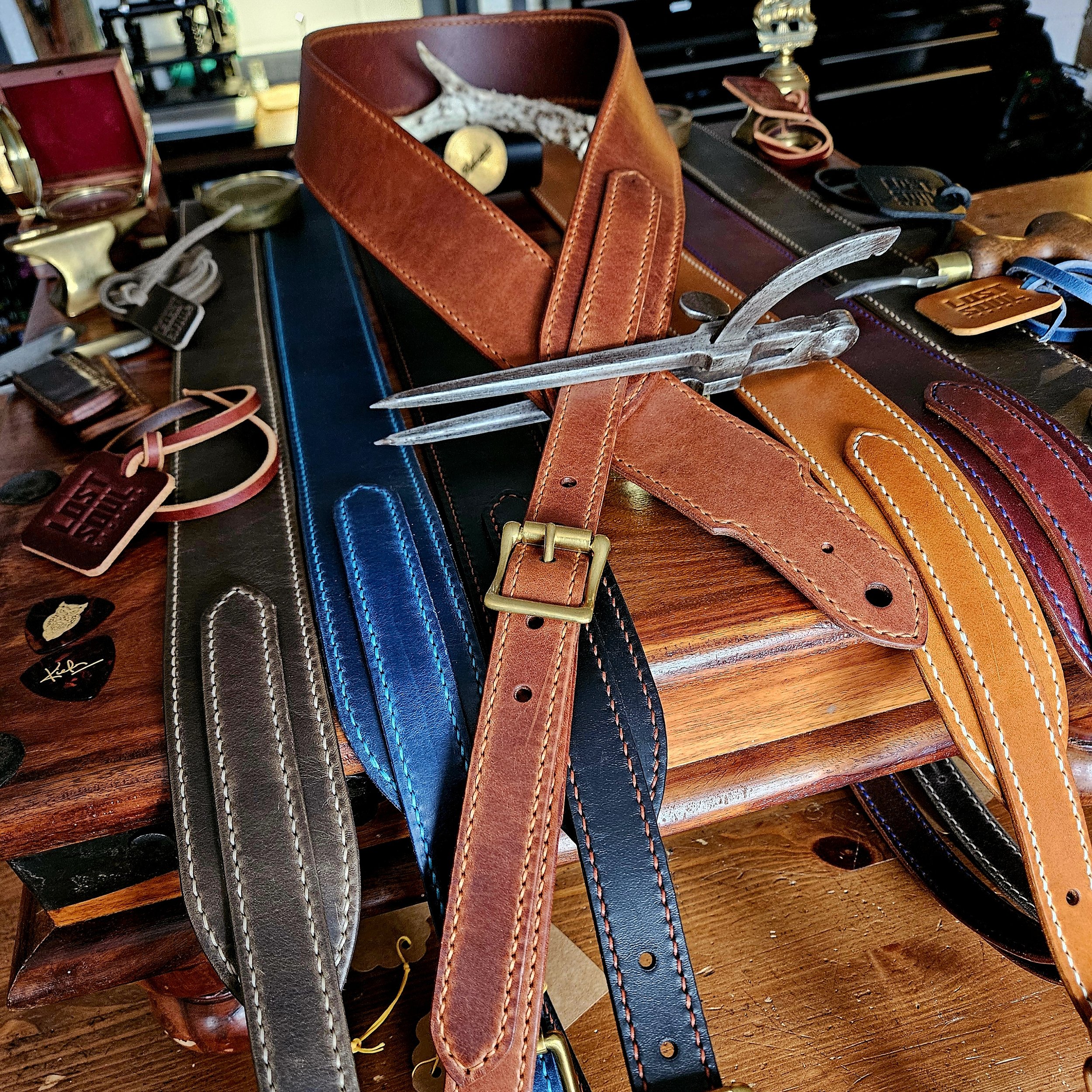 Hand made leather guitar strap. Hand stitched. Solid brass buckle. Made in UK.