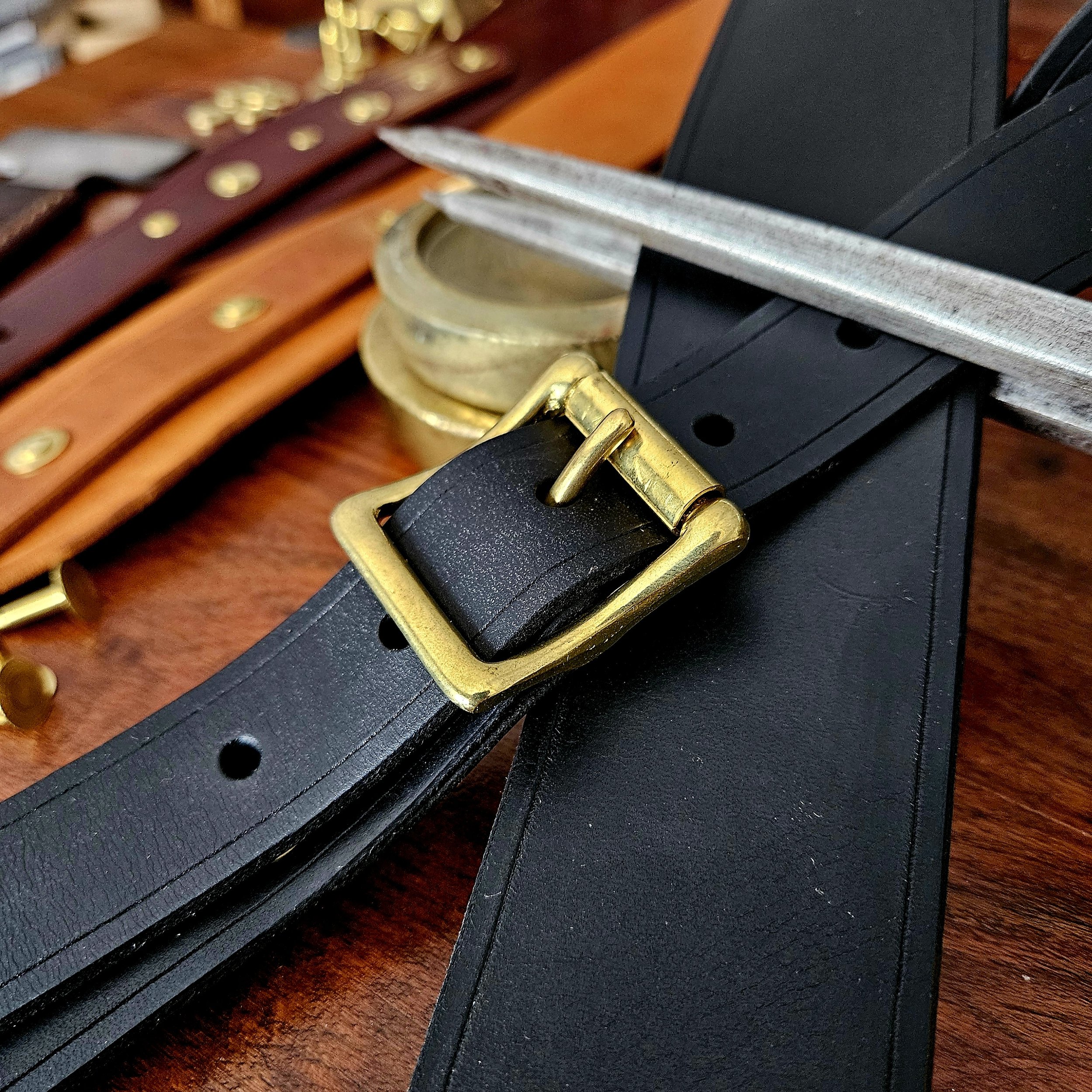 Hand made leather guitar strap. Solid Brass Buckle. Riveted. Made in UK.