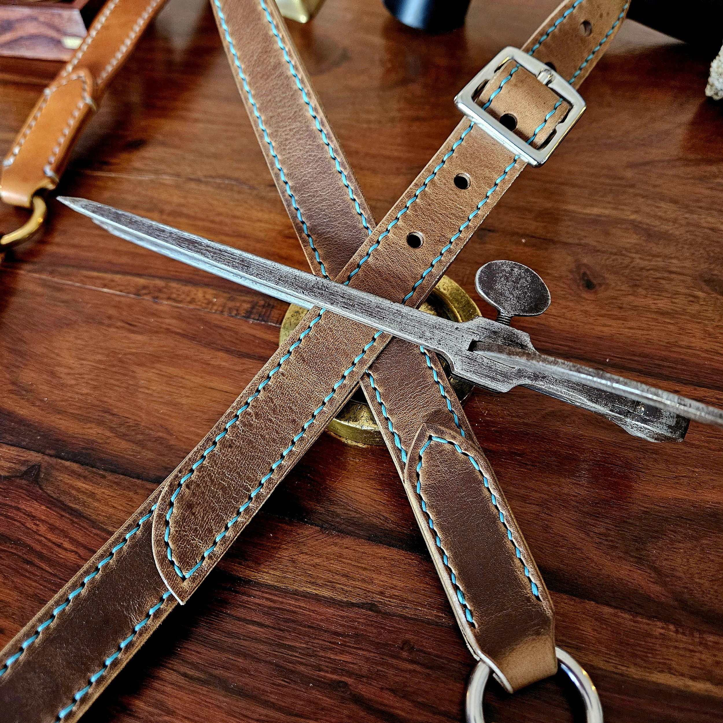 Hand made, hand stitched leather guitar strap. Highest quality UK sourced leather. Made to measure. Decorative ring design.