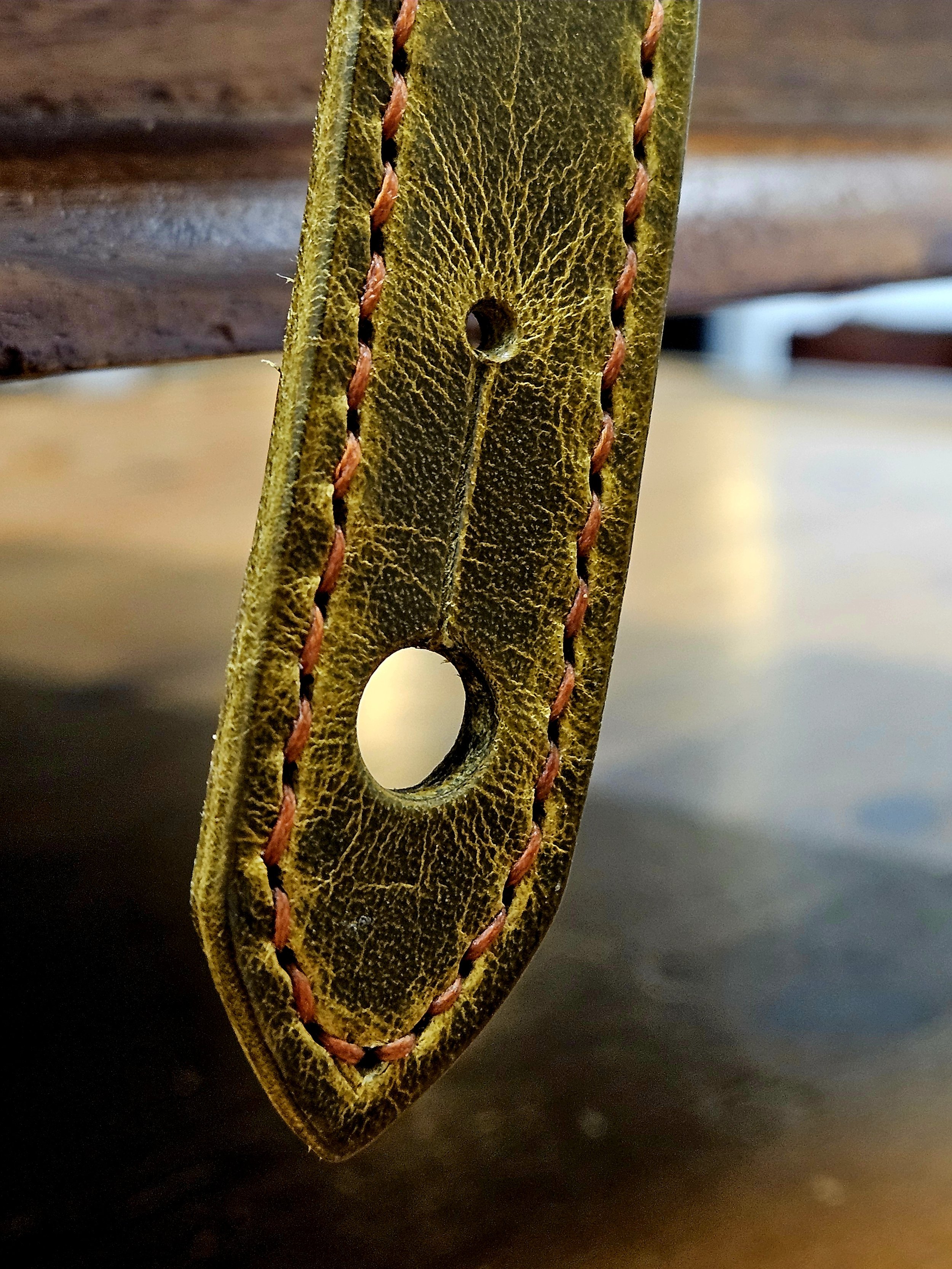 Hand made leather guitar strap. Hand stitched. Solid brass buckle. Made in UK.