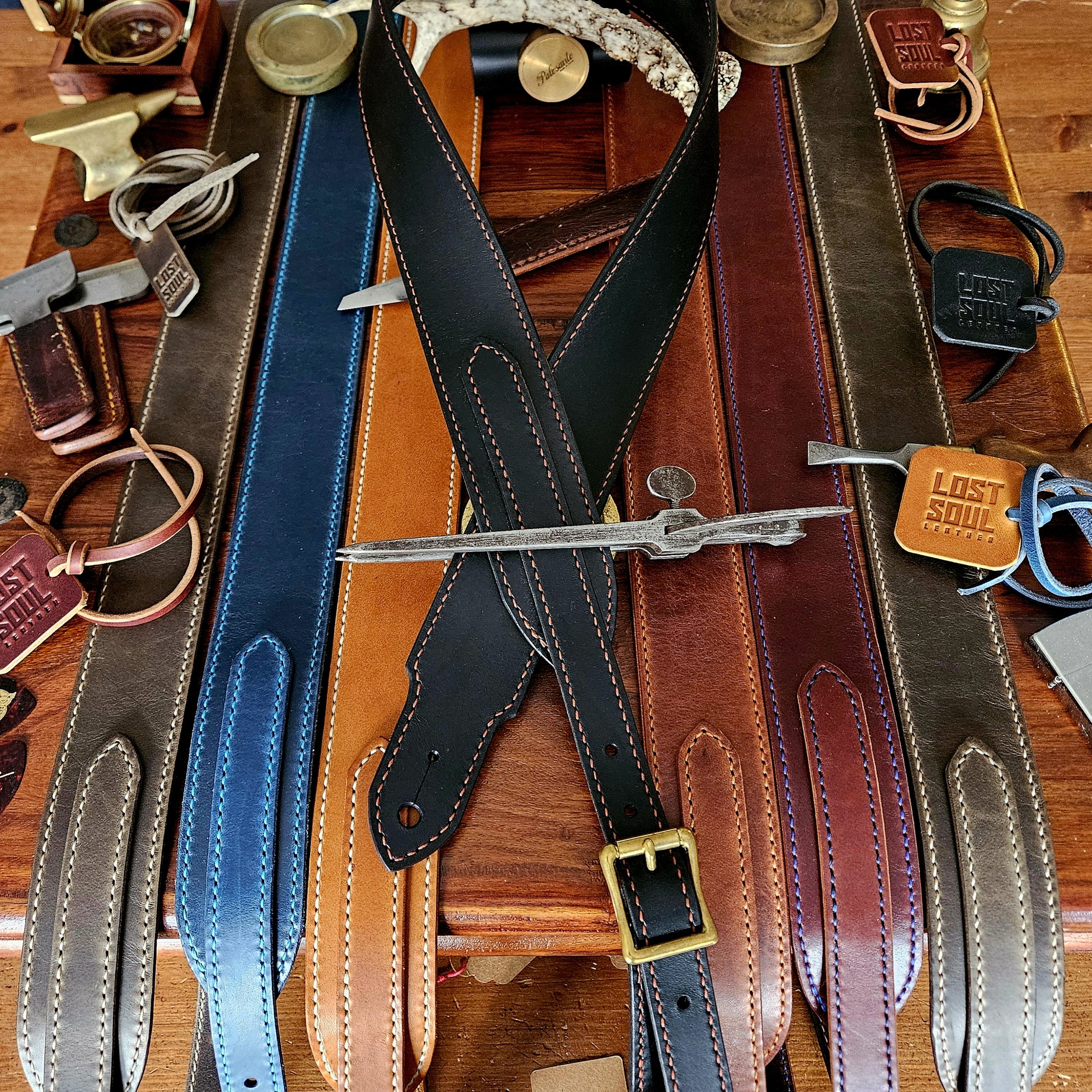 Hand made leather guitar strap. Hand stitched. Solid brass buckle. Made in UK.