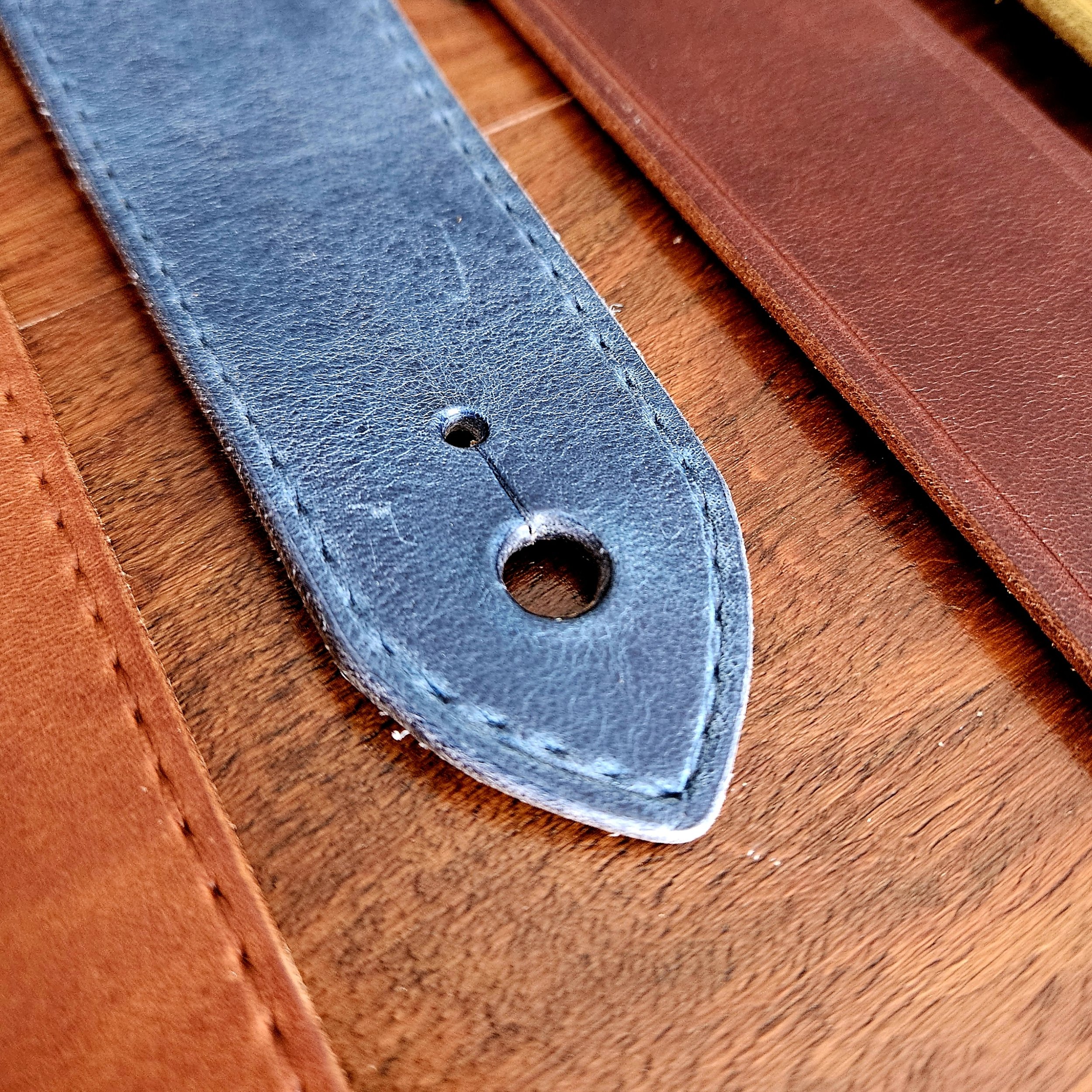 Hand made leather guitar strap. Made in UK.