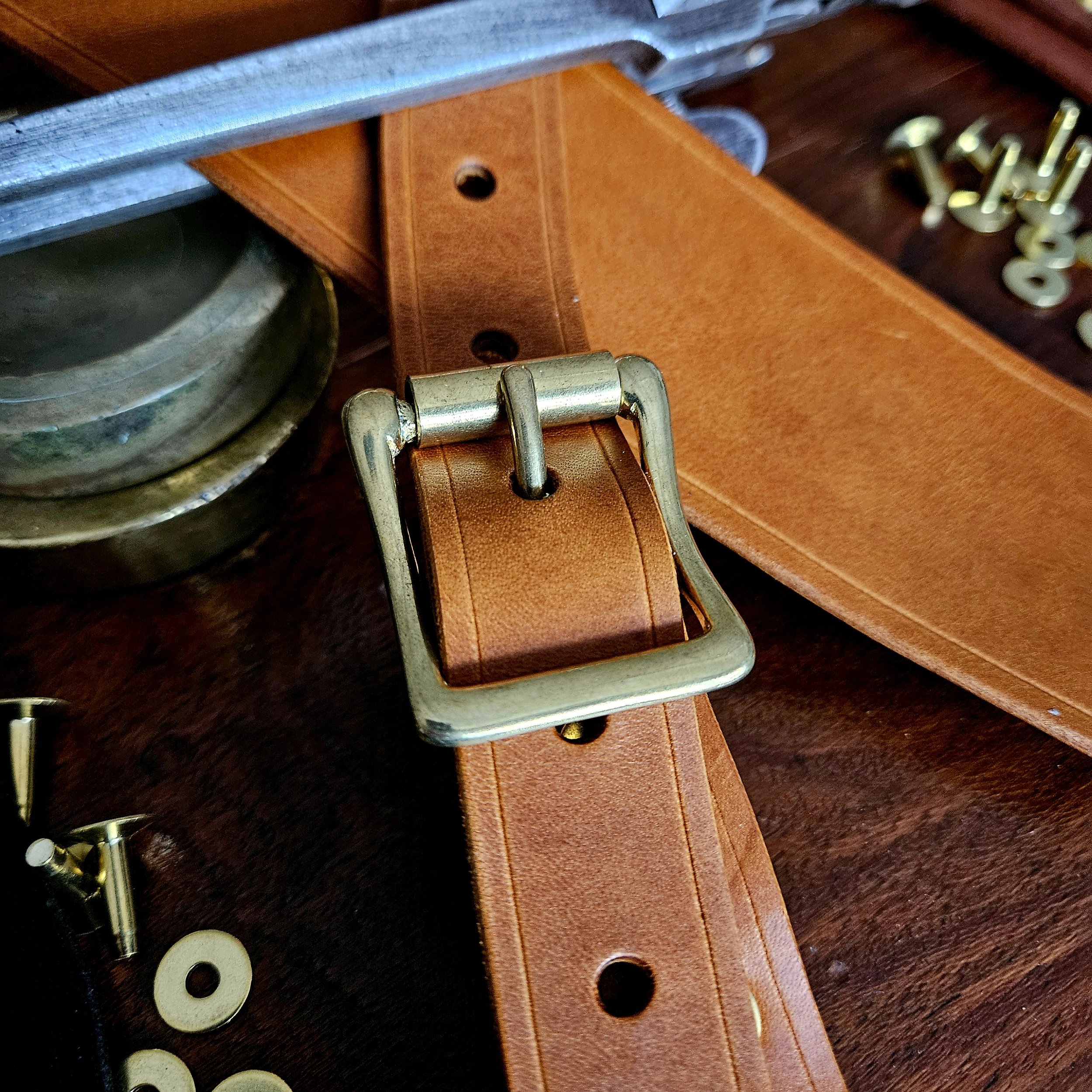 Hand made leather guitar strap. Solid Brass Buckle. Riveted. Made in UK.