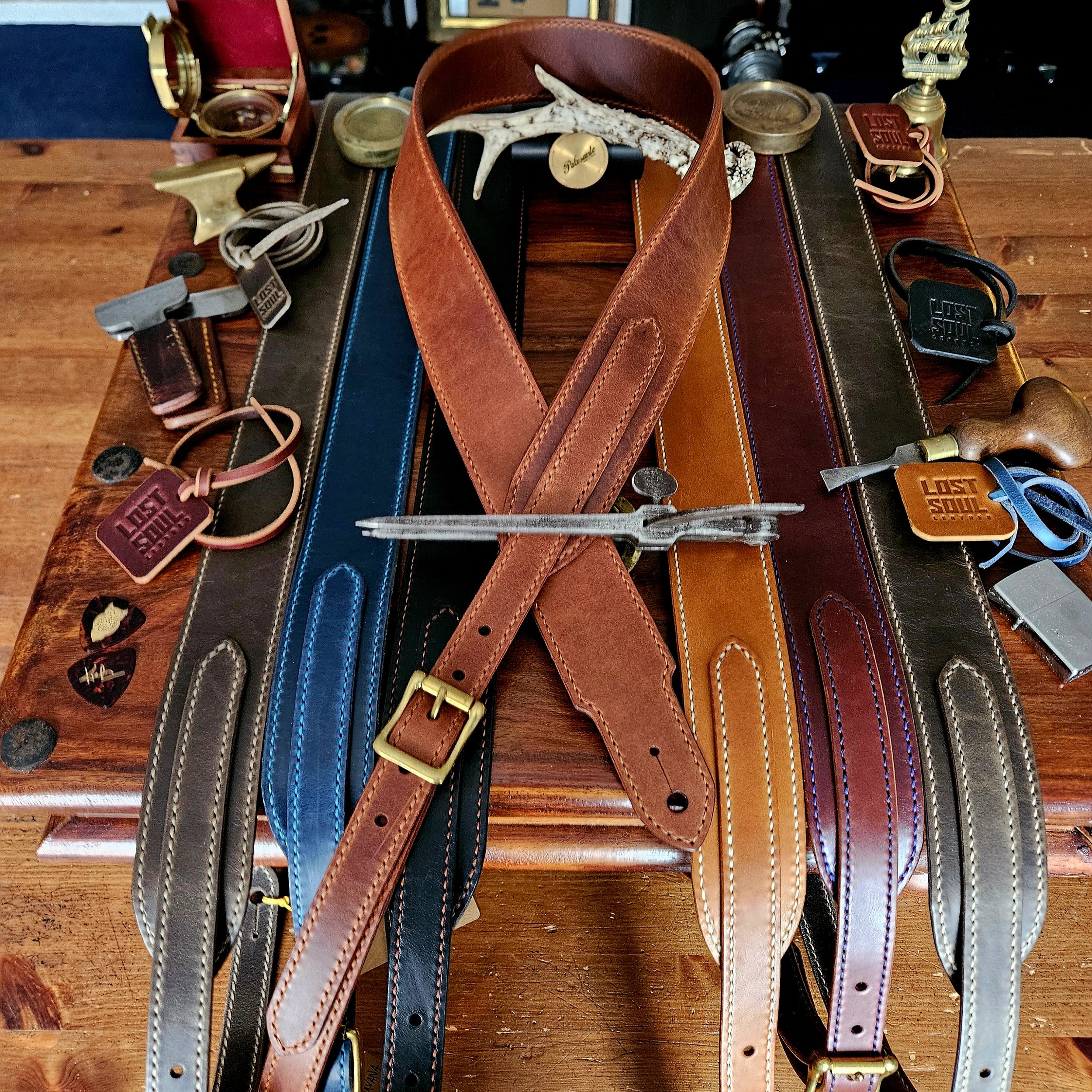 Hand made leather guitar strap. Hand stitched. Solid brass buckle. Made in UK.