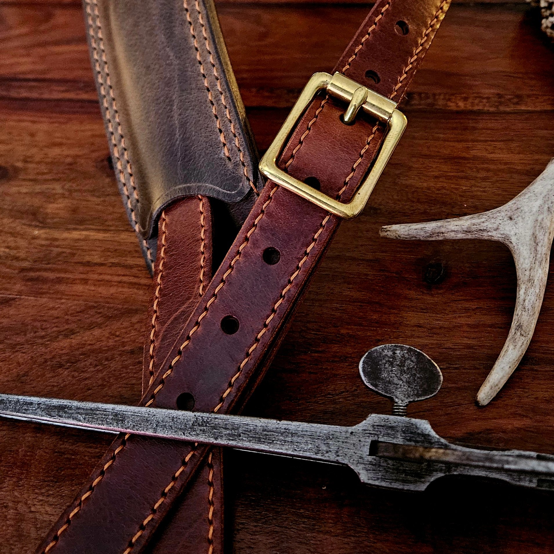 Hand made, hand stitched leather guitar strap. Highest quality UK sourced leather. Made to measure. Unique shoulder pad design.