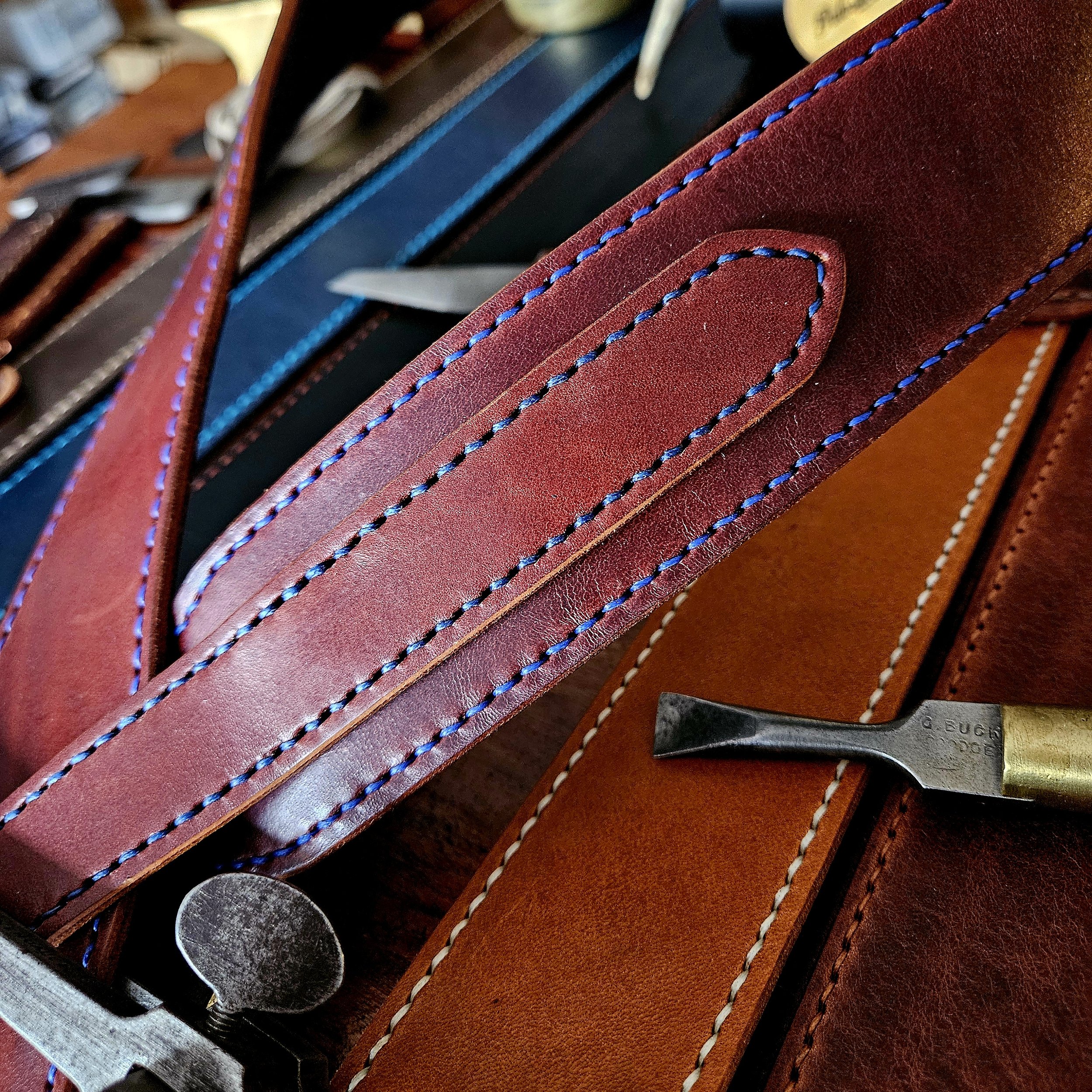 Hand made leather guitar strap. Hand stitched. Solid brass buckle. Made in UK.