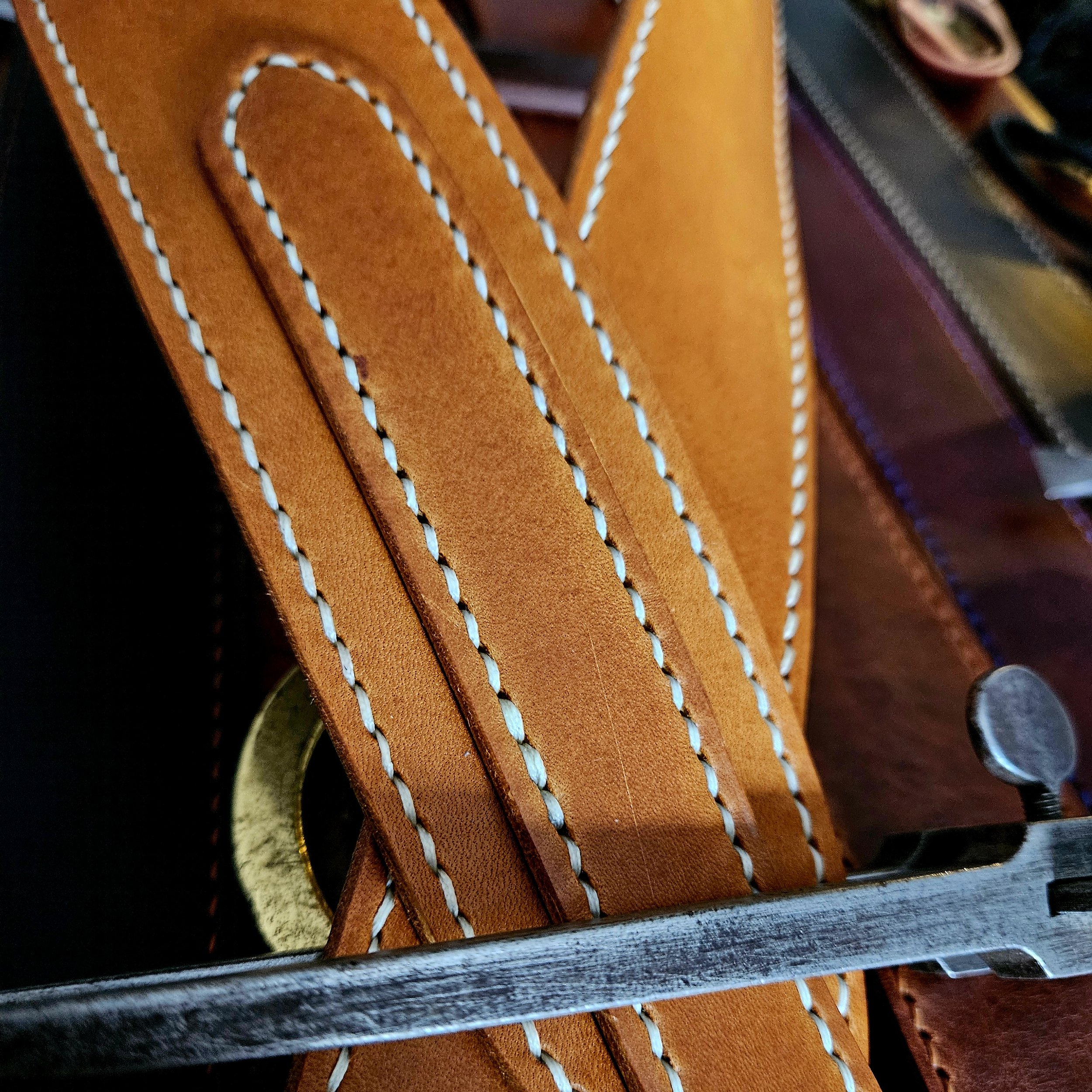 Hand made, hand stitched leather guitar strap. Highest quality UK sourced leather. Made to measure.