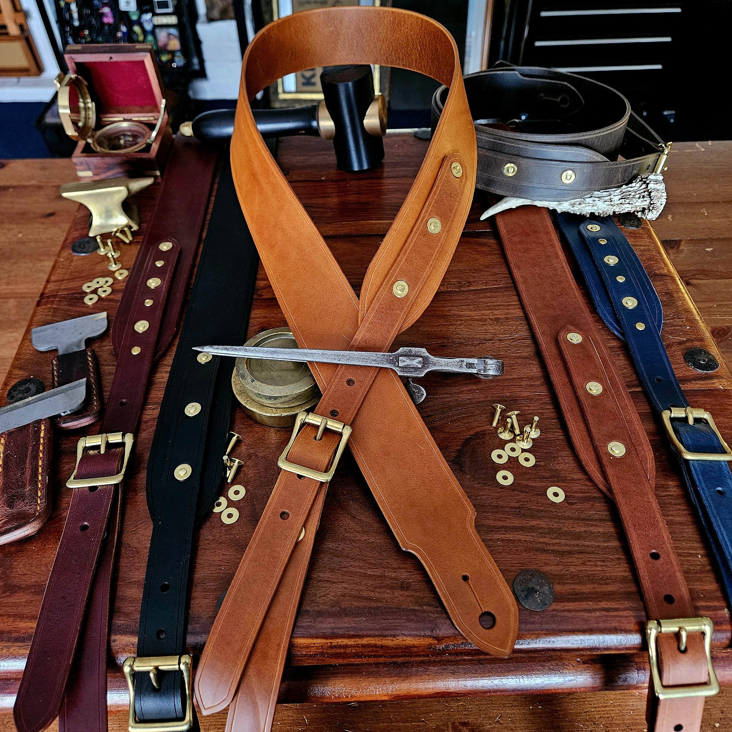 Hand made leather guitar strap. Solid Brass Buckle. Riveted. Made in UK.