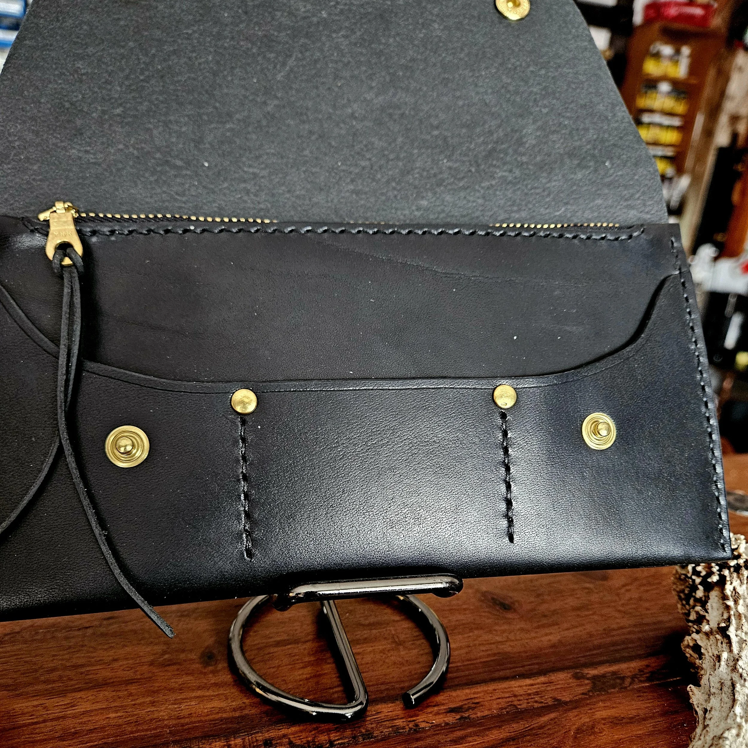 Ladies vegetable tanned leather handmade, hand stitched clutch purse. Made in UK.