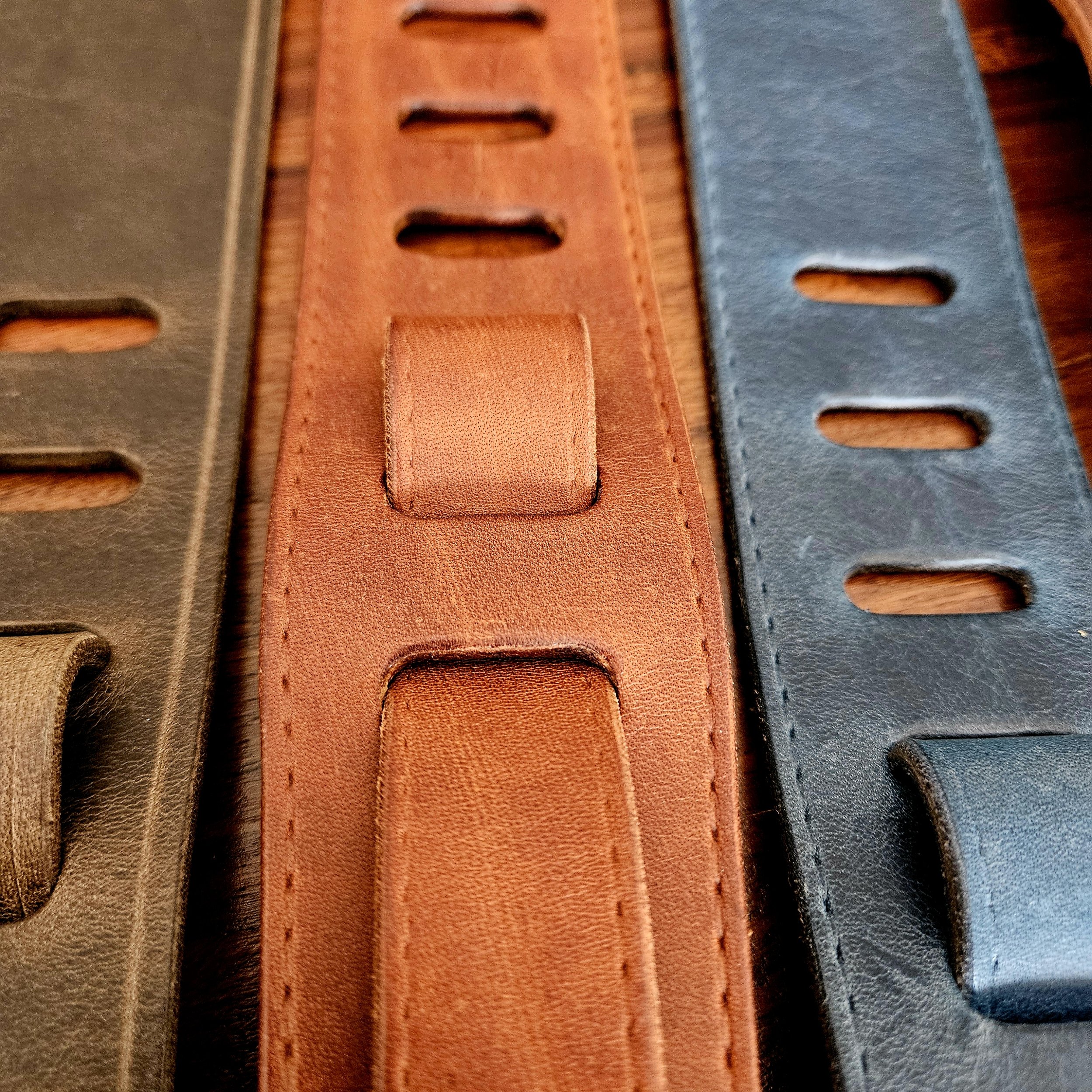 Hand made leather guitar strap. Made in UK.