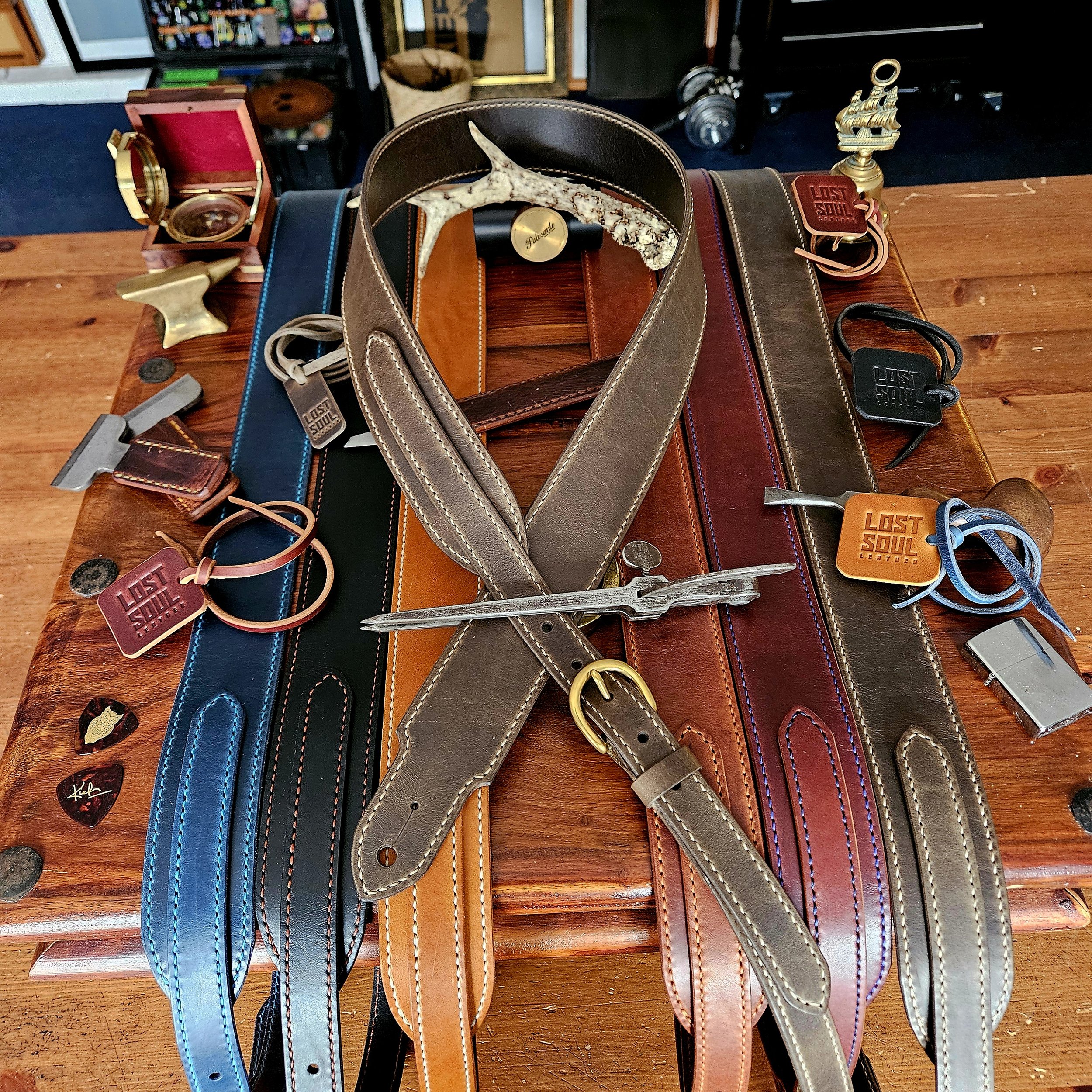 Hand made leather guitar strap. Hand stitched. Solid brass buckle. Made in UK.