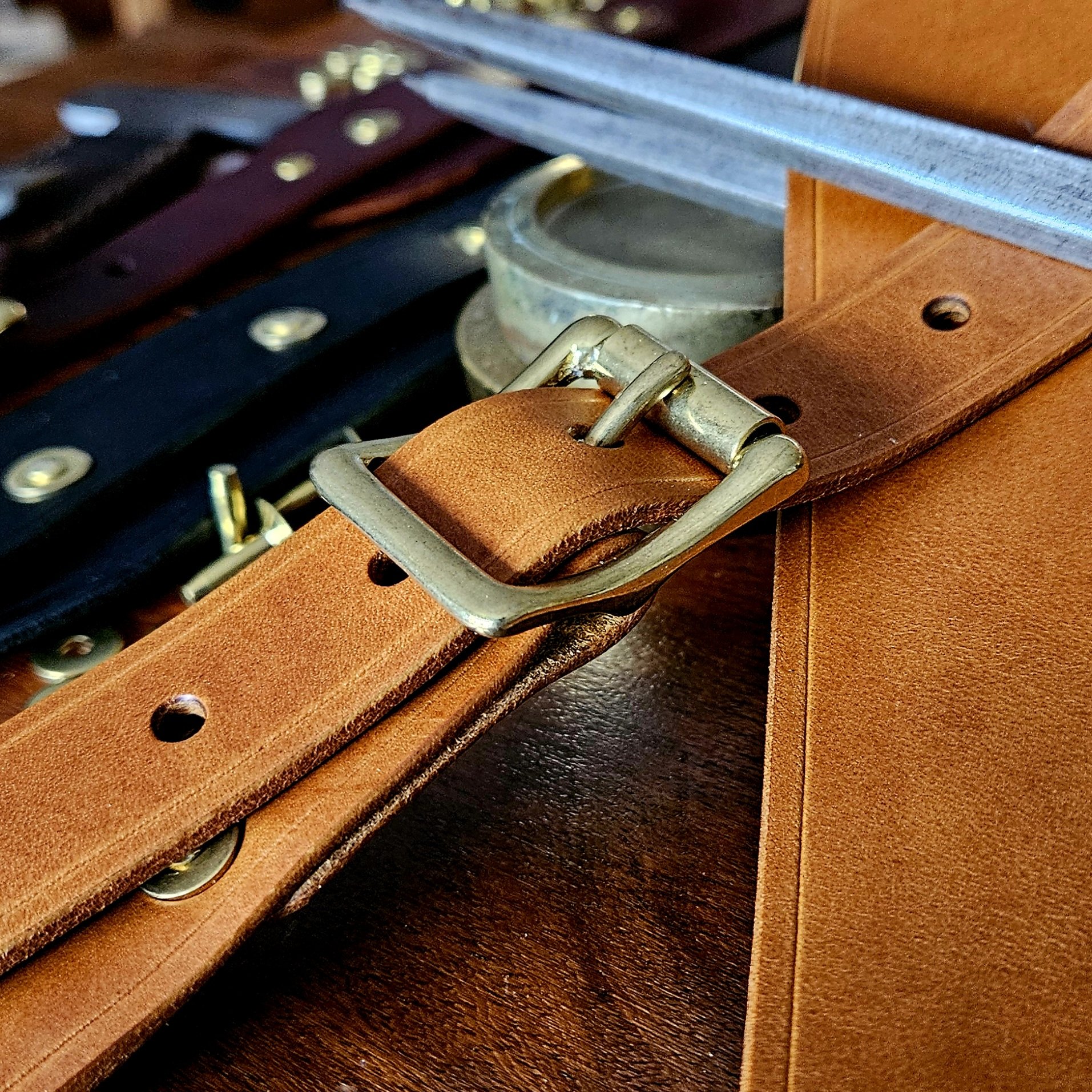 Hand made leather guitar strap. Solid Brass Buckle. Riveted. Made in UK.