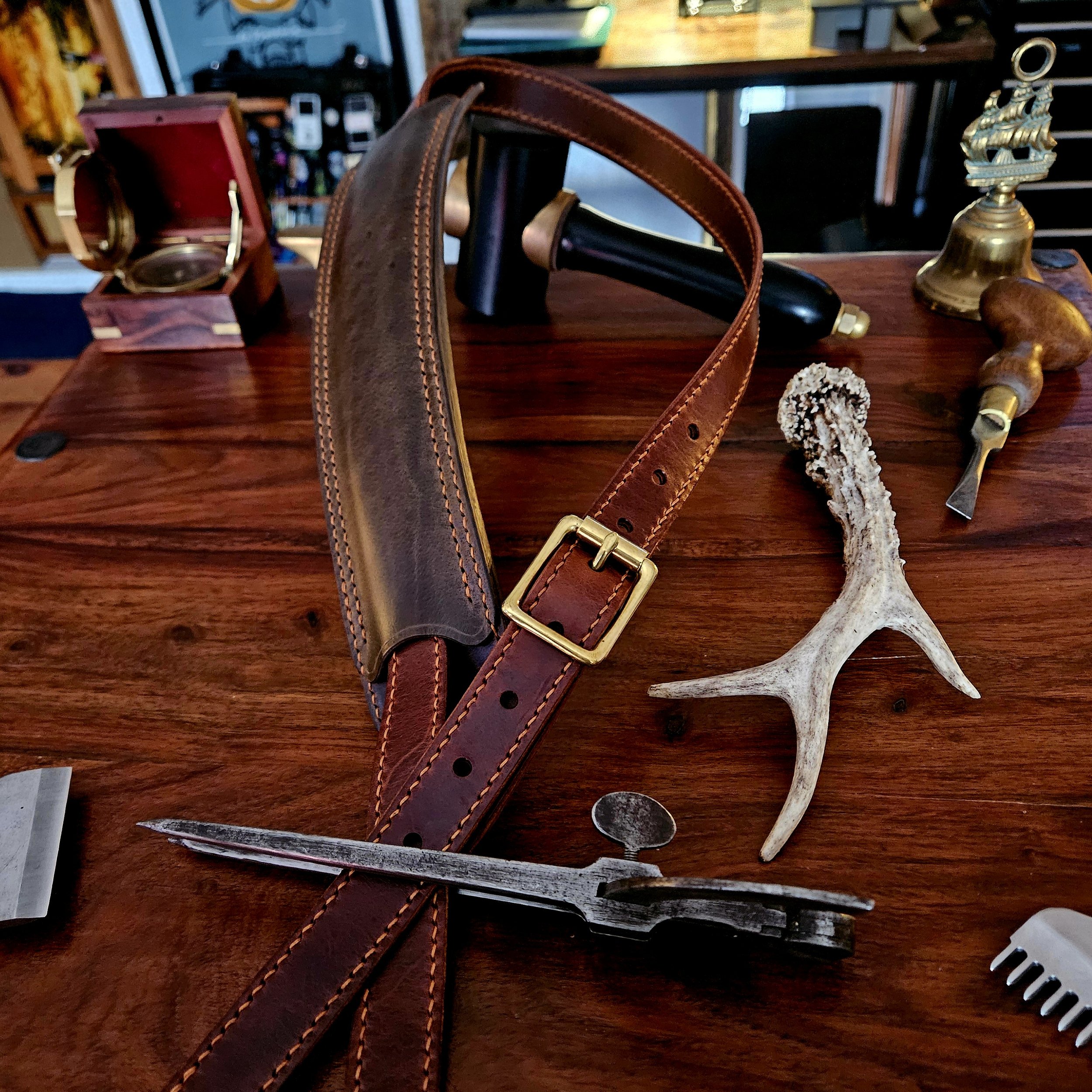 Hand made, hand stitched leather guitar strap. Highest quality UK sourced leather. Made to measure. Unique shoulder pad design.