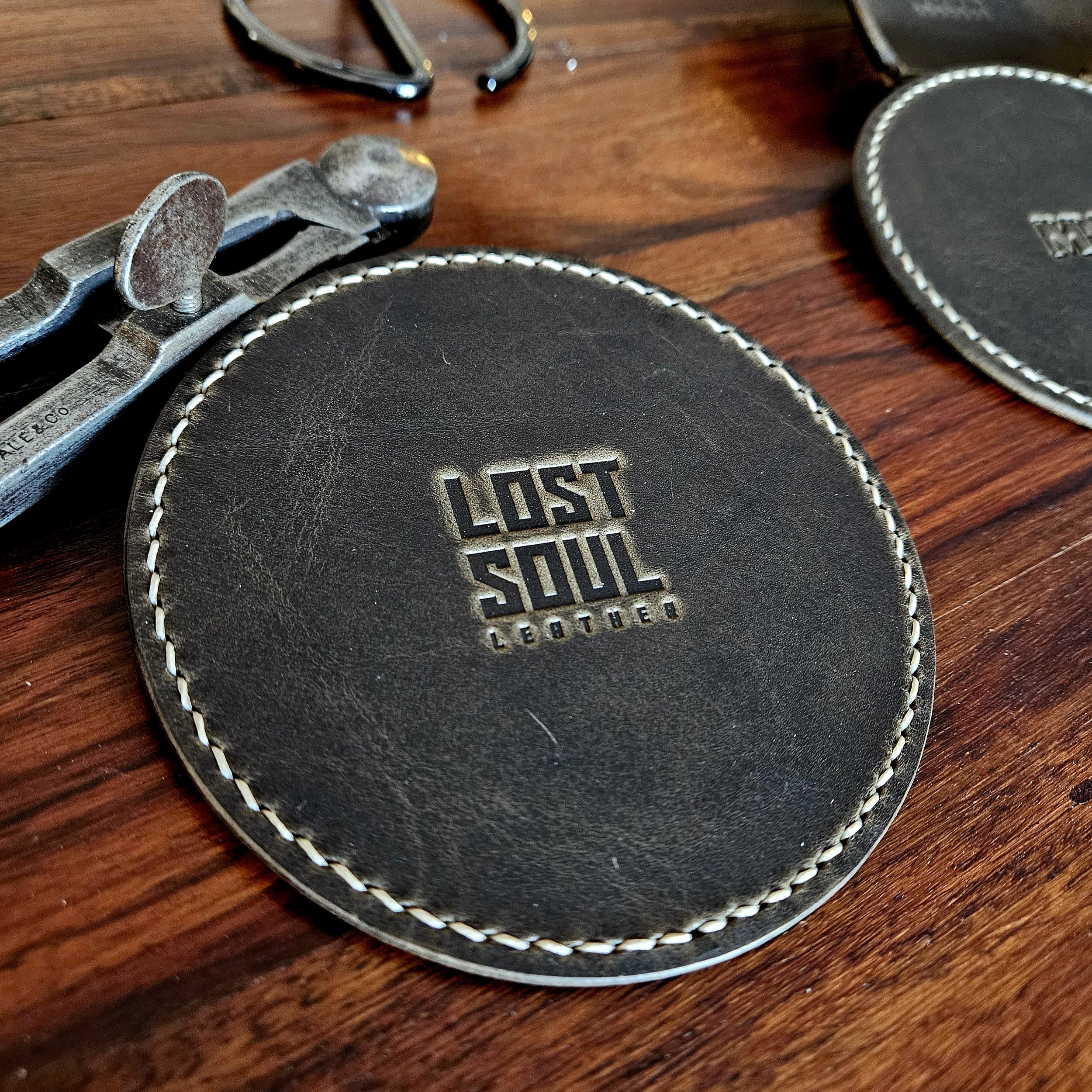 Hand stitched vegetable tanned leather coaster. Personalised.