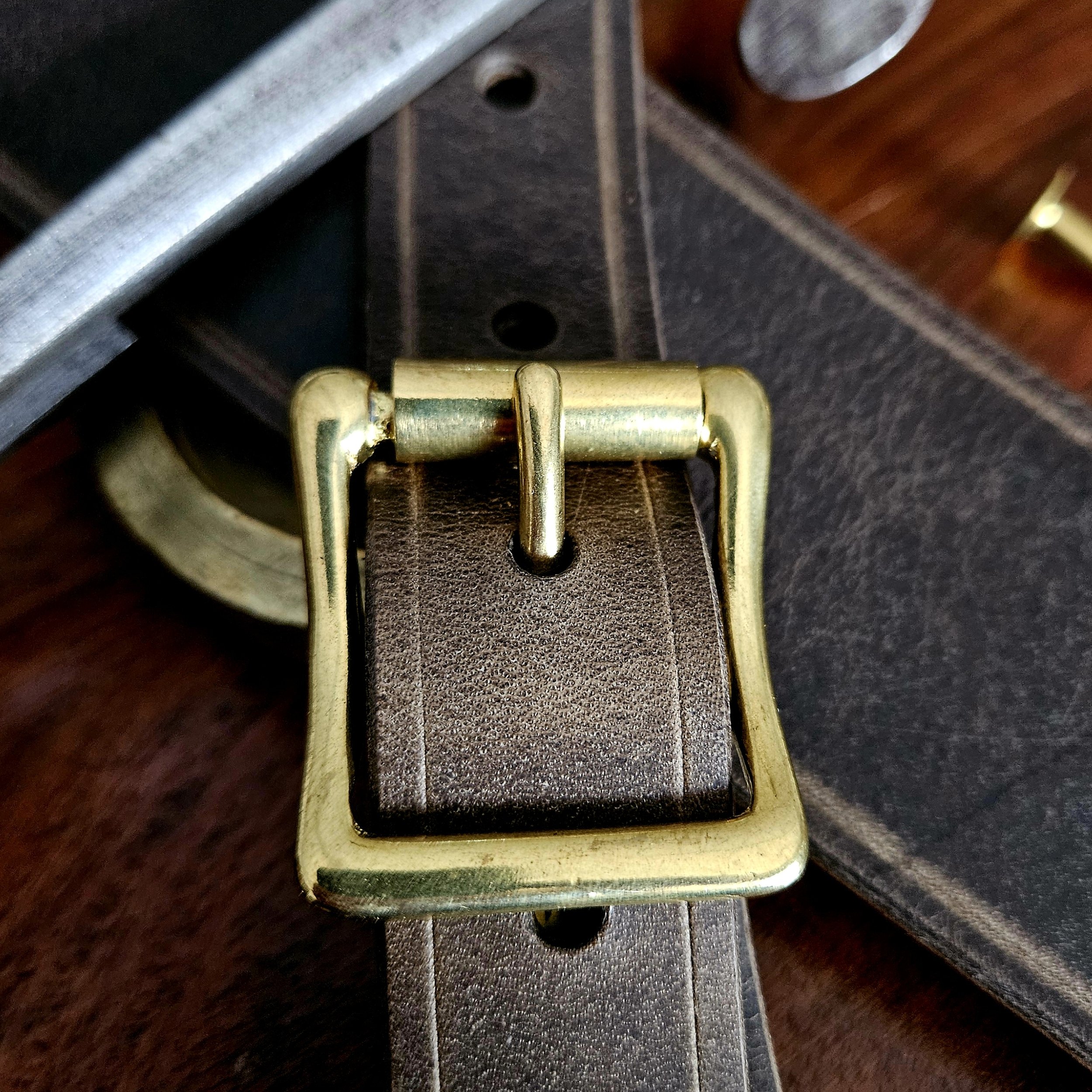 Hand made leather guitar strap. Solid Brass Buckle. Riveted. Made in UK.
