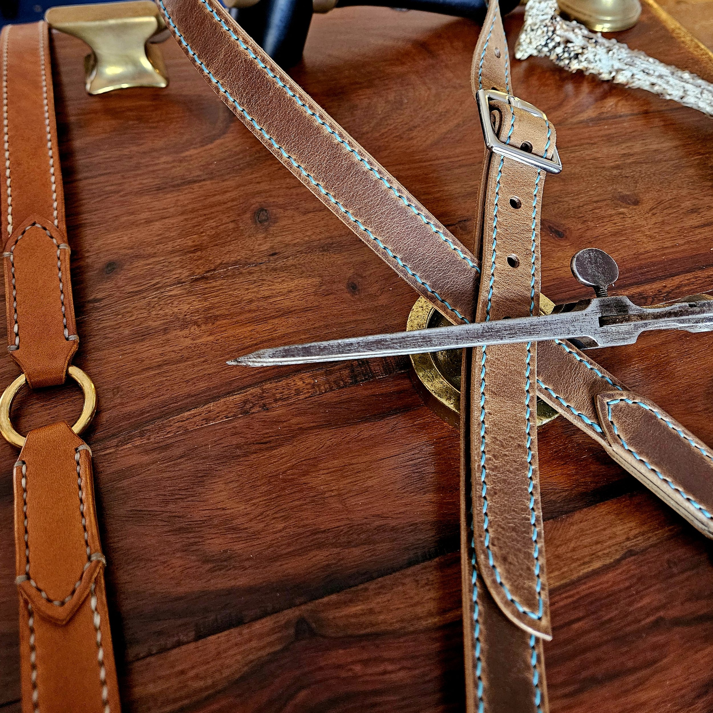 Hand made, hand stitched leather guitar strap. Highest quality UK sourced leather. Made to measure. Decorative ring design.