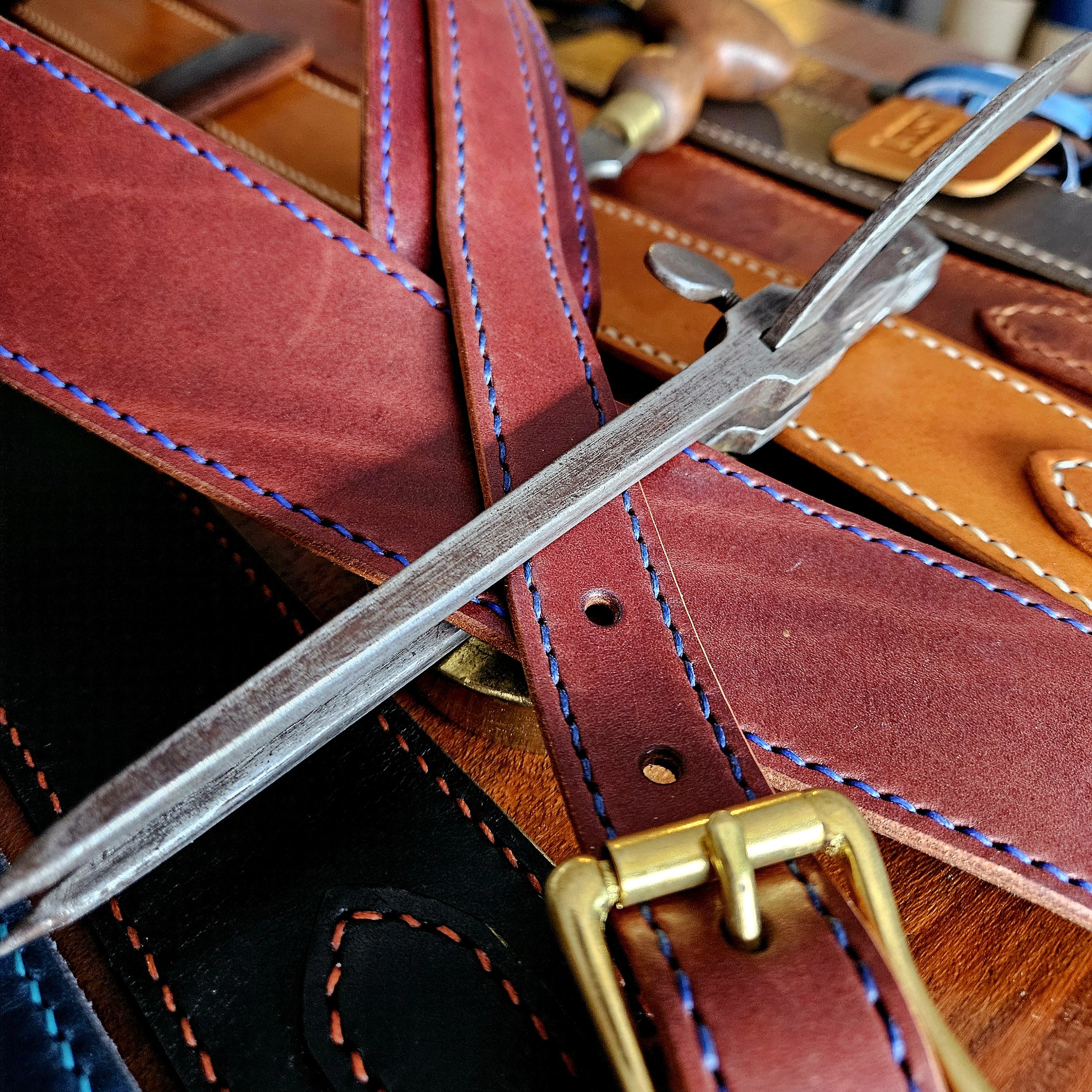 Hand made leather guitar strap. Hand stitched. Solid brass buckle. Made in UK.