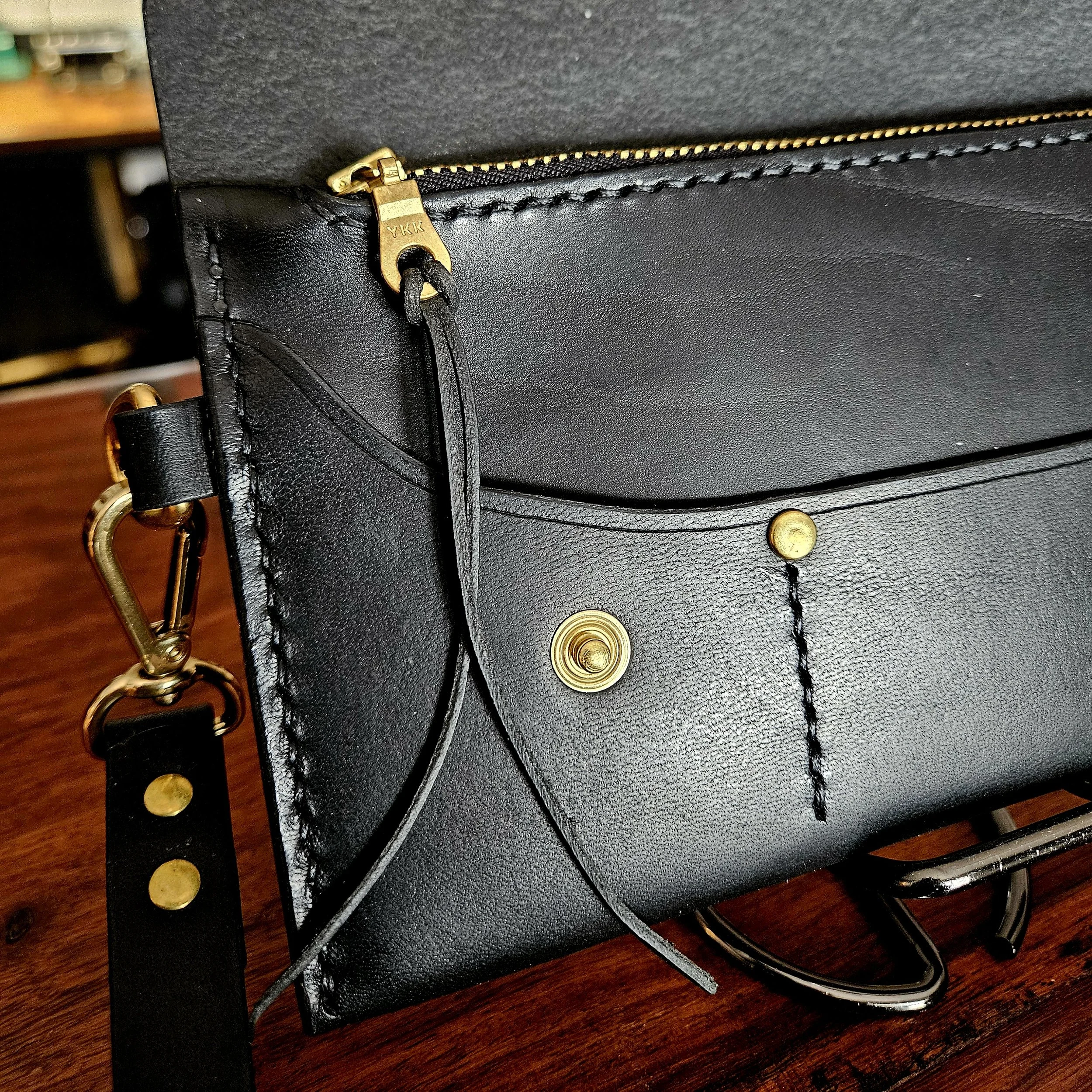 Ladies vegetable tanned leather handmade, hand stitched clutch purse. Made in UK.