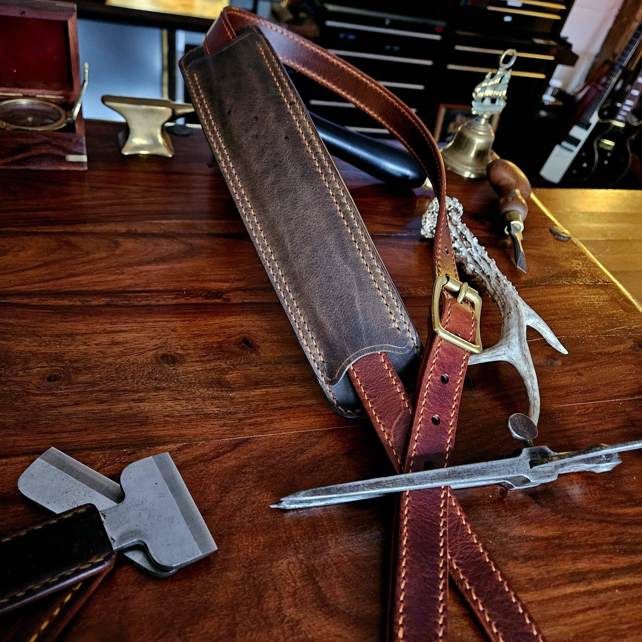 Hand made, hand stitched leather guitar strap. Highest quality UK sourced leather. Made to measure. Unique shoulder pad design.