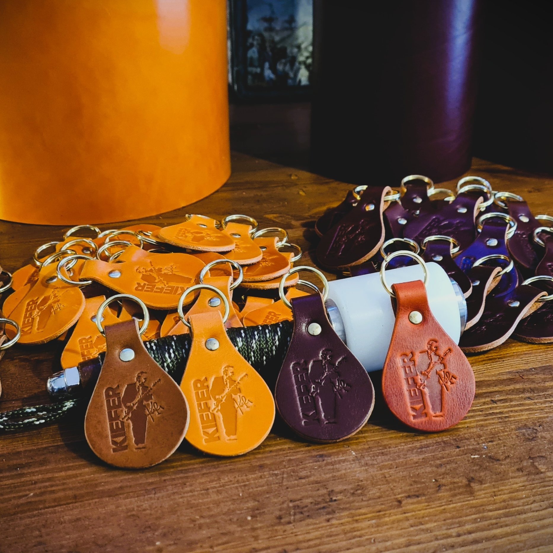 Banded key fobs and merchandise. Vegetable tanned leather. Stamped. Solid brass fittings. One of a kind. Merchandise.