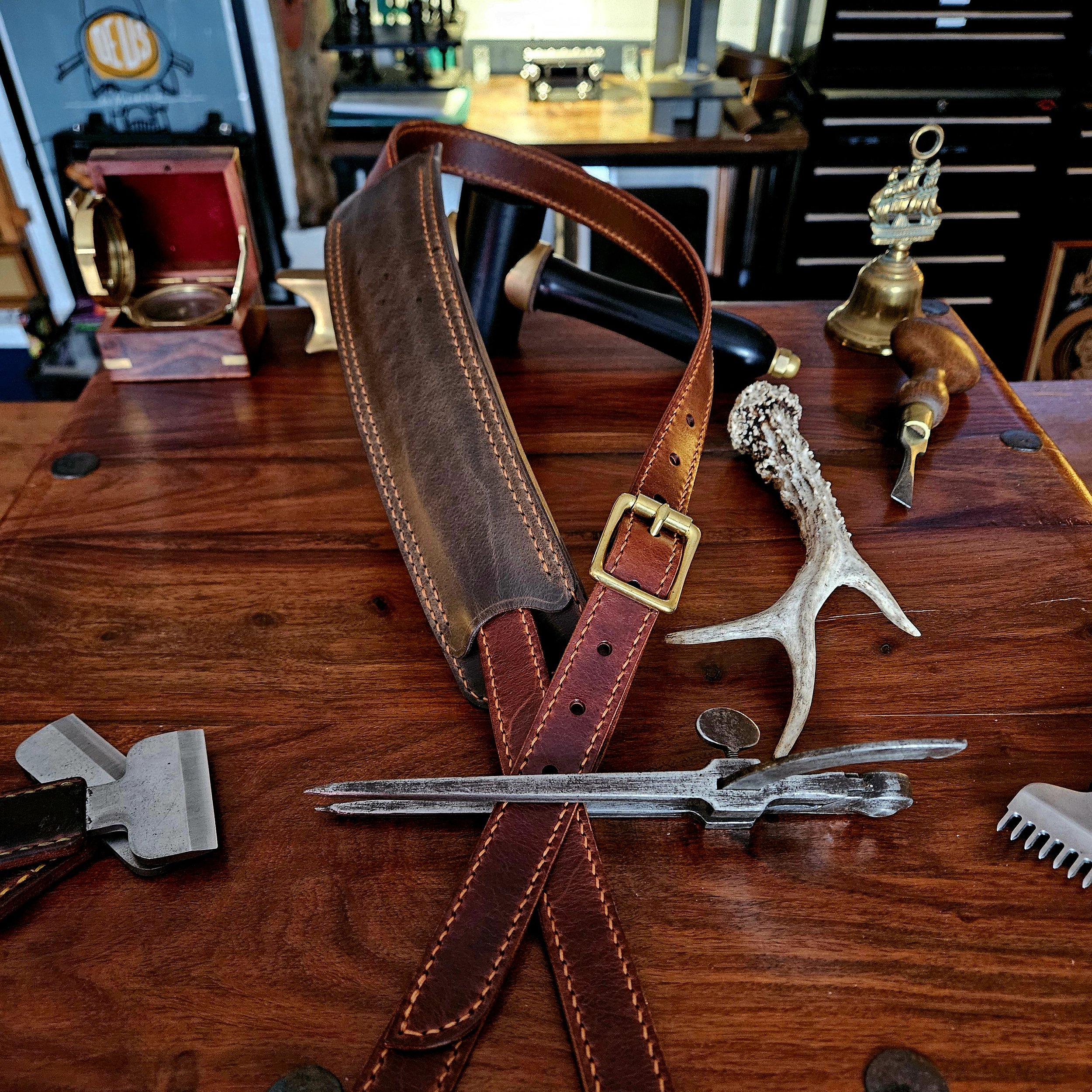 Hand made, hand stitched leather guitar strap. Highest quality UK sourced leather. Made to measure. Unique shoulder pad design.