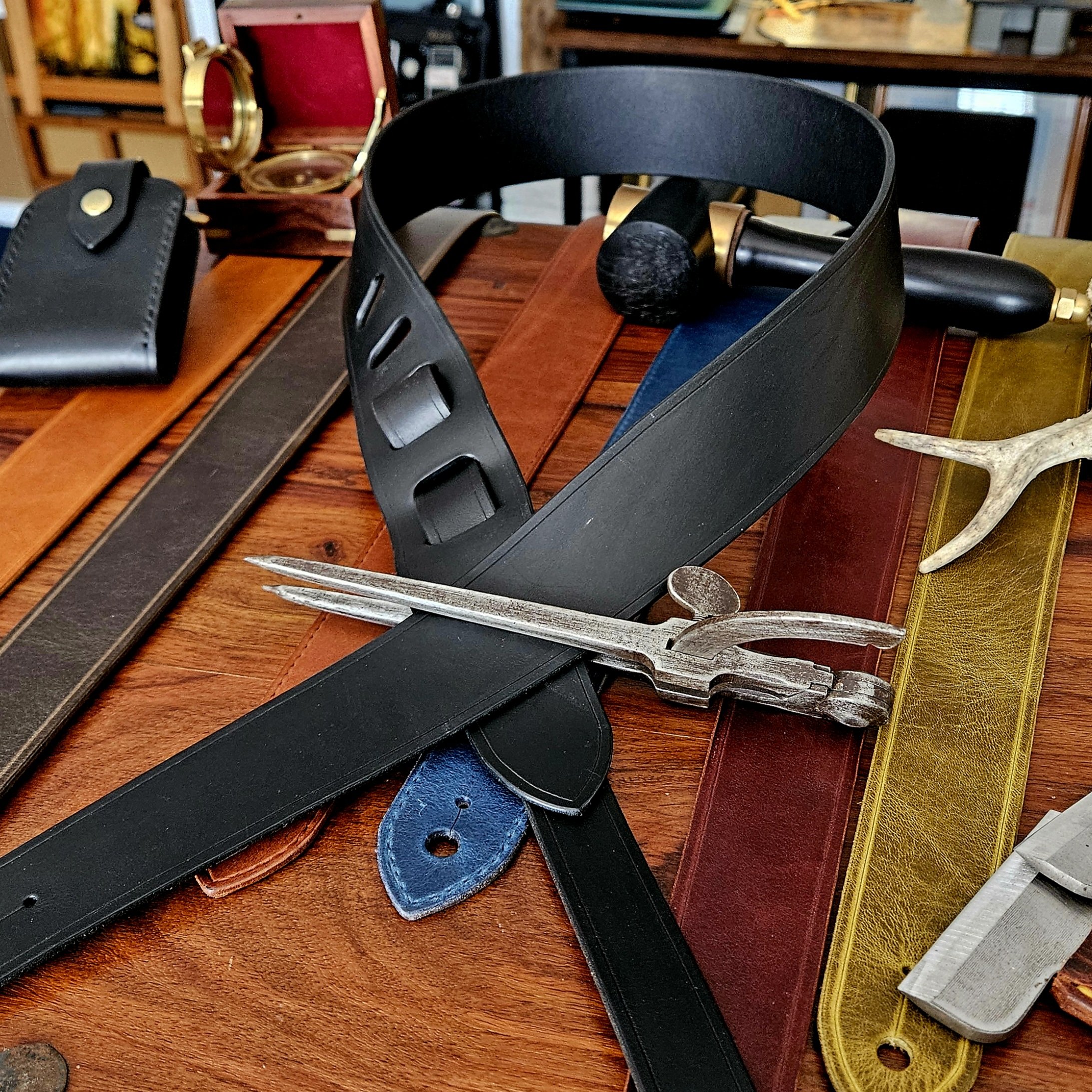 Hand made leather guitar strap. Made in UK.
