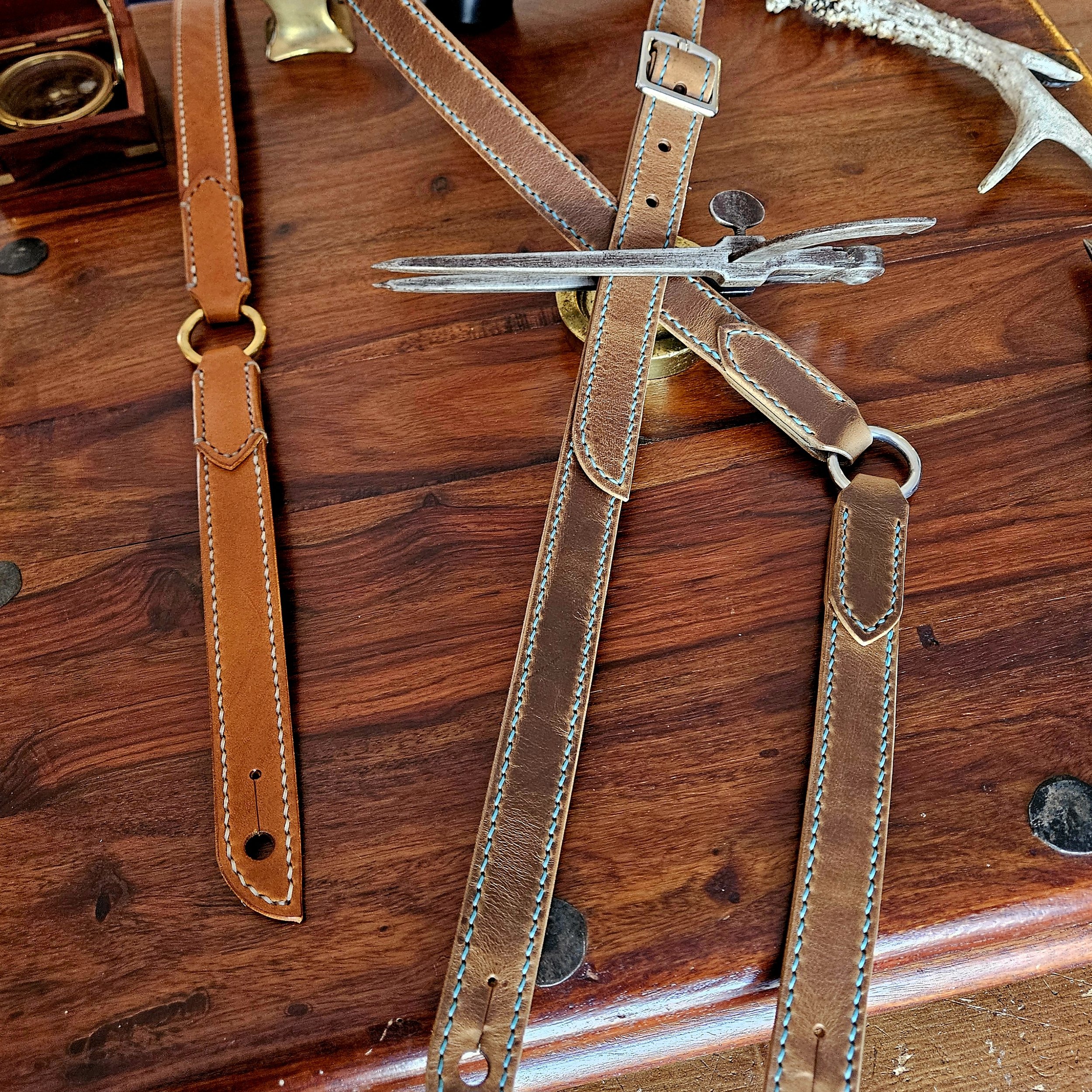 Hand made, hand stitched leather guitar strap. Highest quality UK sourced leather. Made to measure. Decorative ring design.