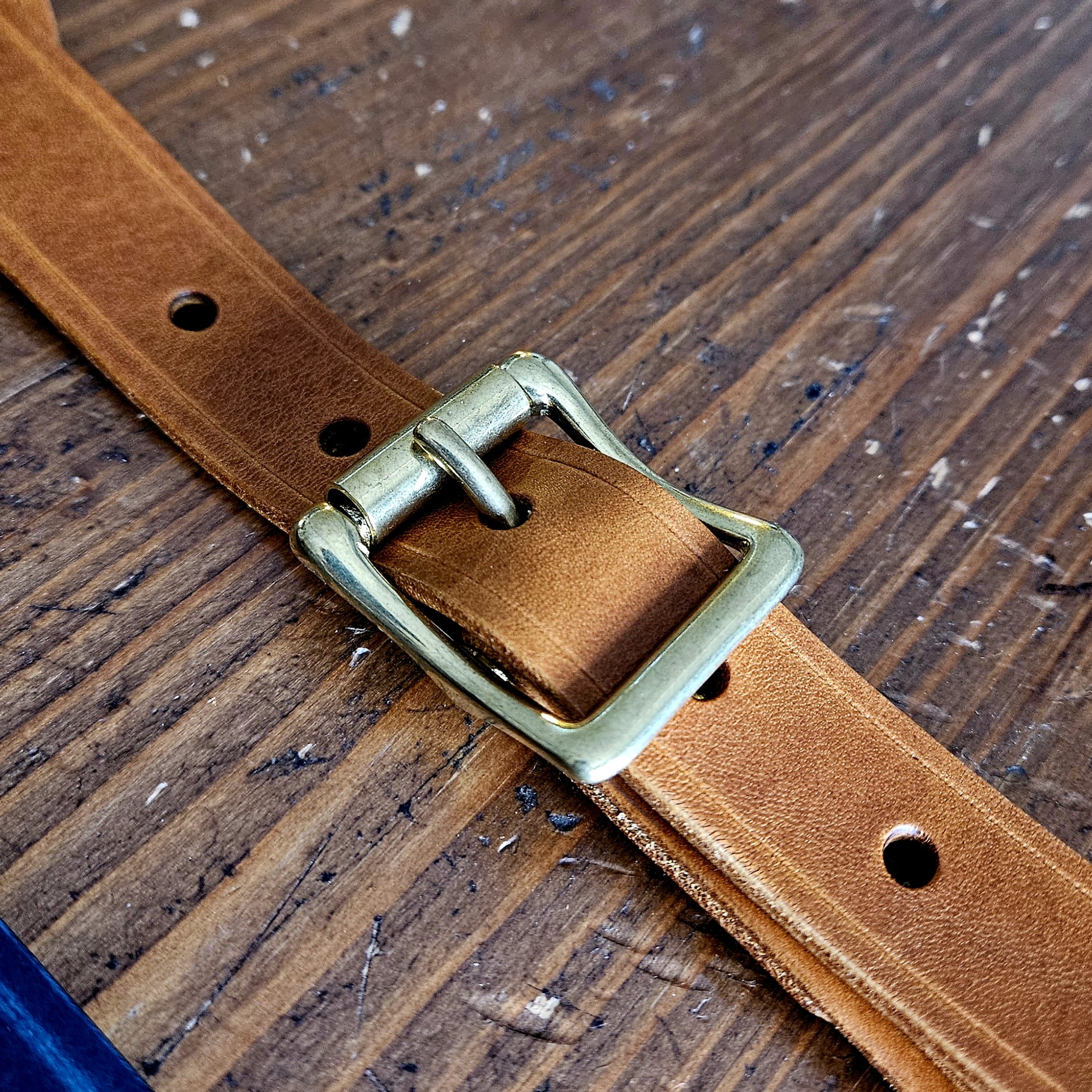 Hand made leather guitar strap. Solid Brass Buckle. Riveted. Made in UK.