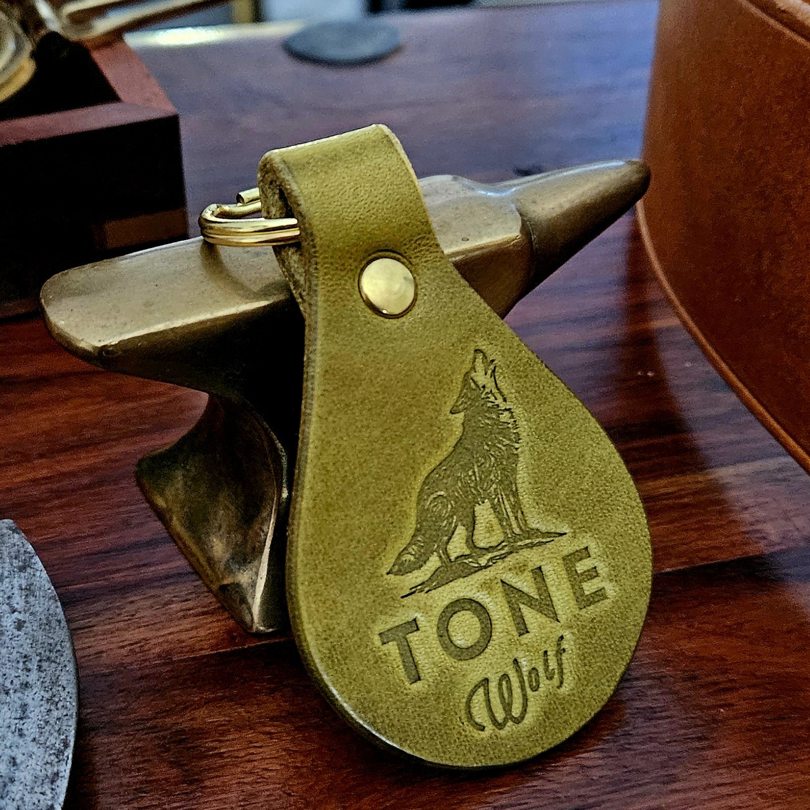 Banded key fobs and merchandise. Vegetable tanned leather. Stamped. Solid brass fittings. One of a kind. Merchandise.