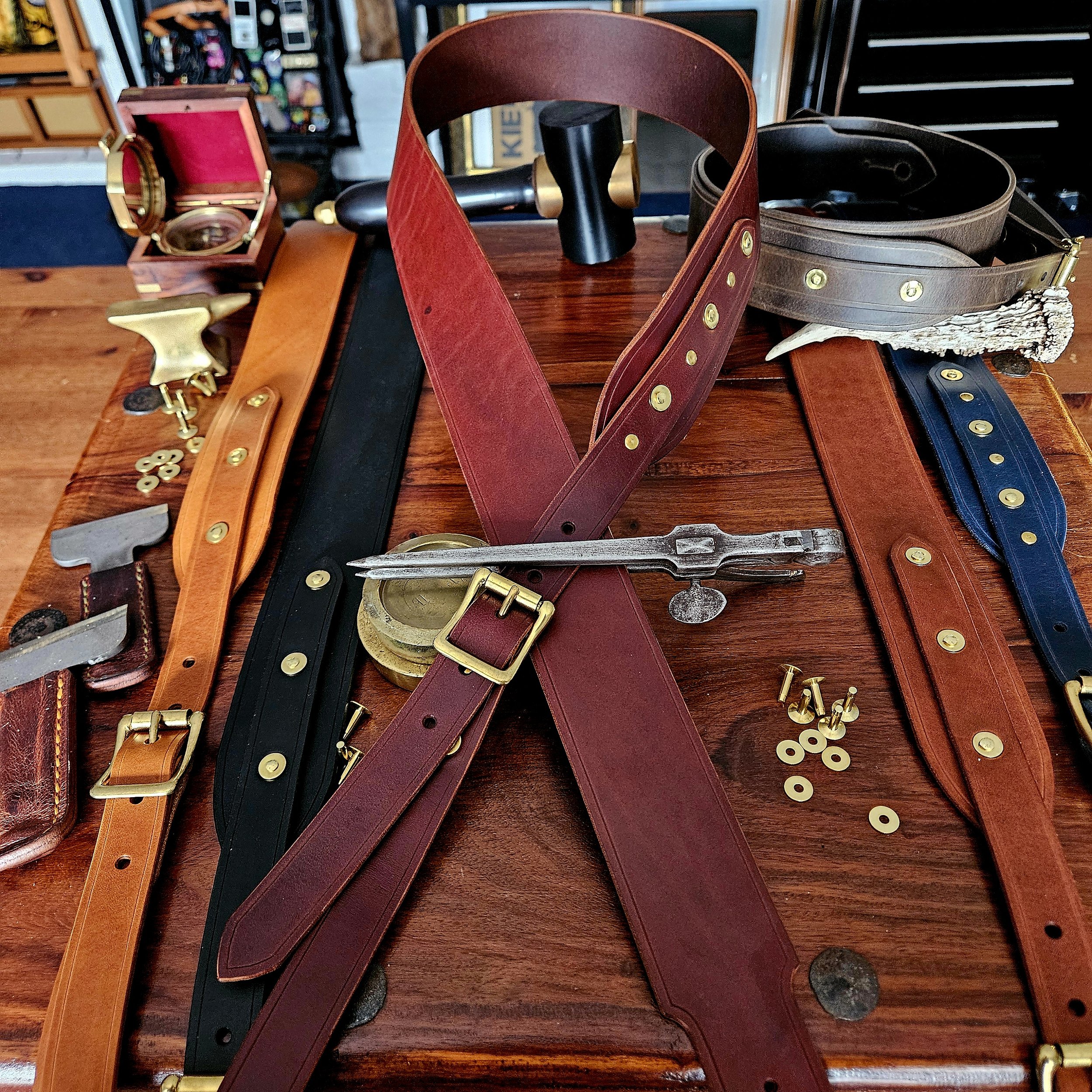 Hand made leather guitar strap. Solid Brass Buckle. Riveted. Made in UK.