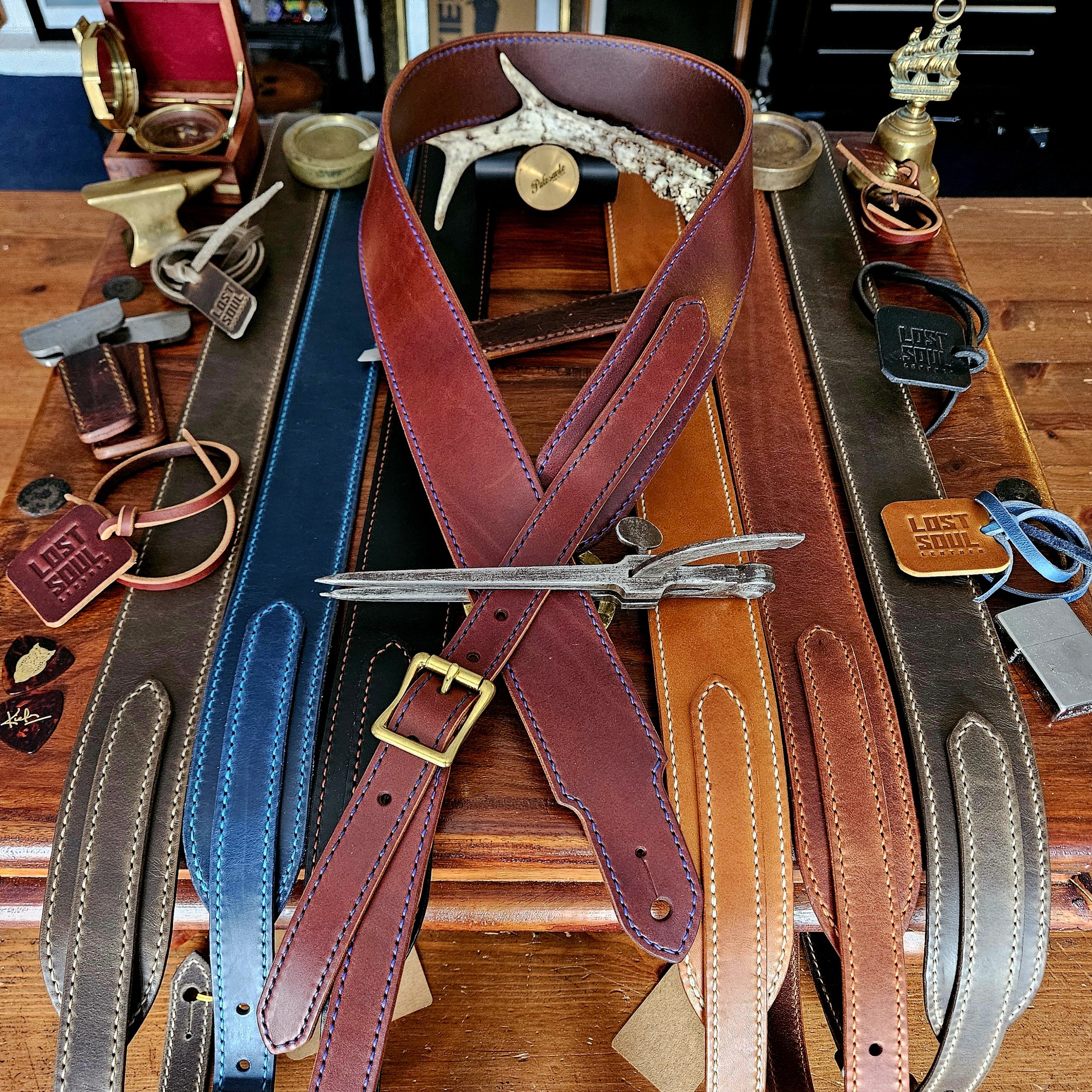 Hand made leather guitar strap. Hand stitched. Solid brass buckle. Made in UK.