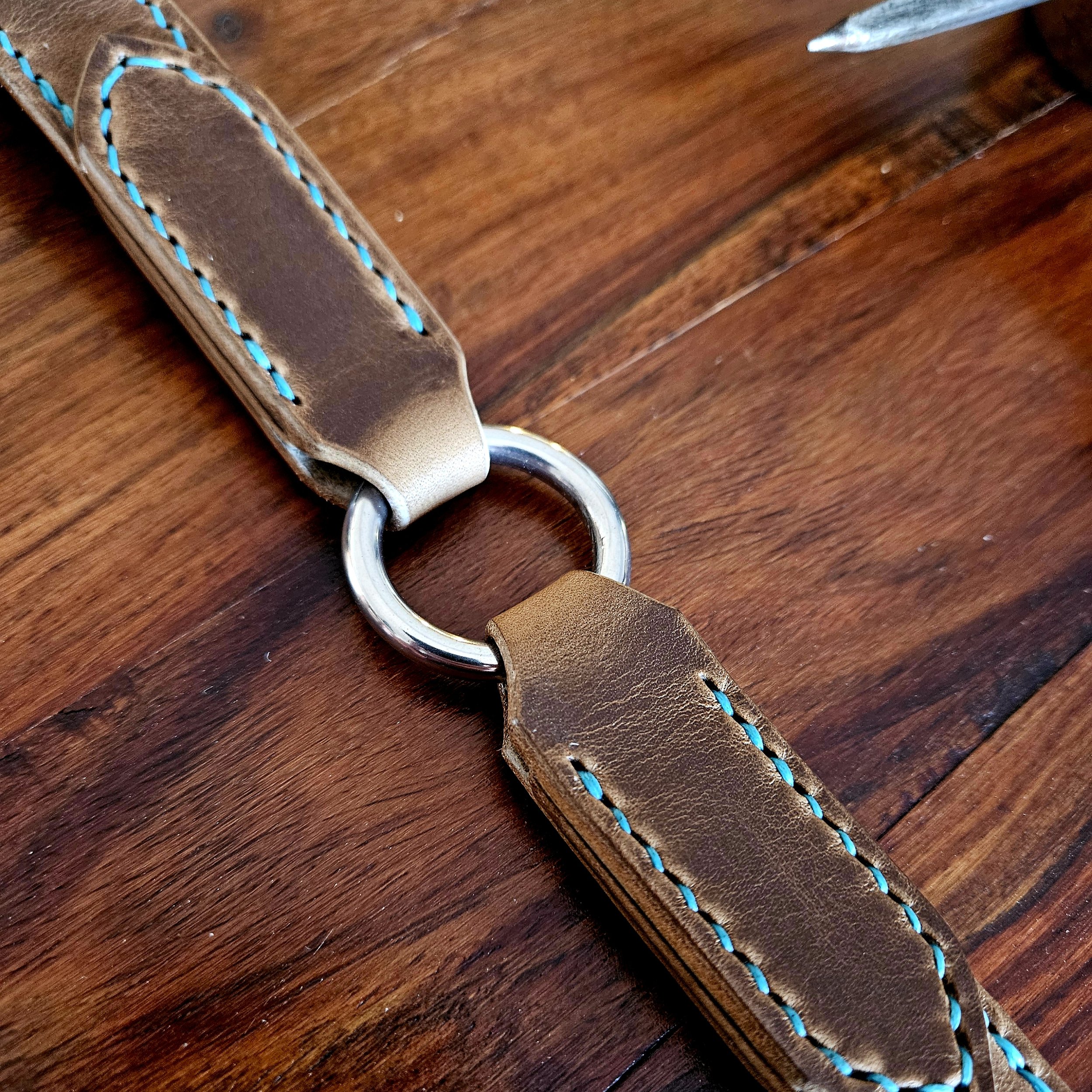 Hand made, hand stitched leather guitar strap. Highest quality UK sourced leather. Made to measure. Decorative ring design.