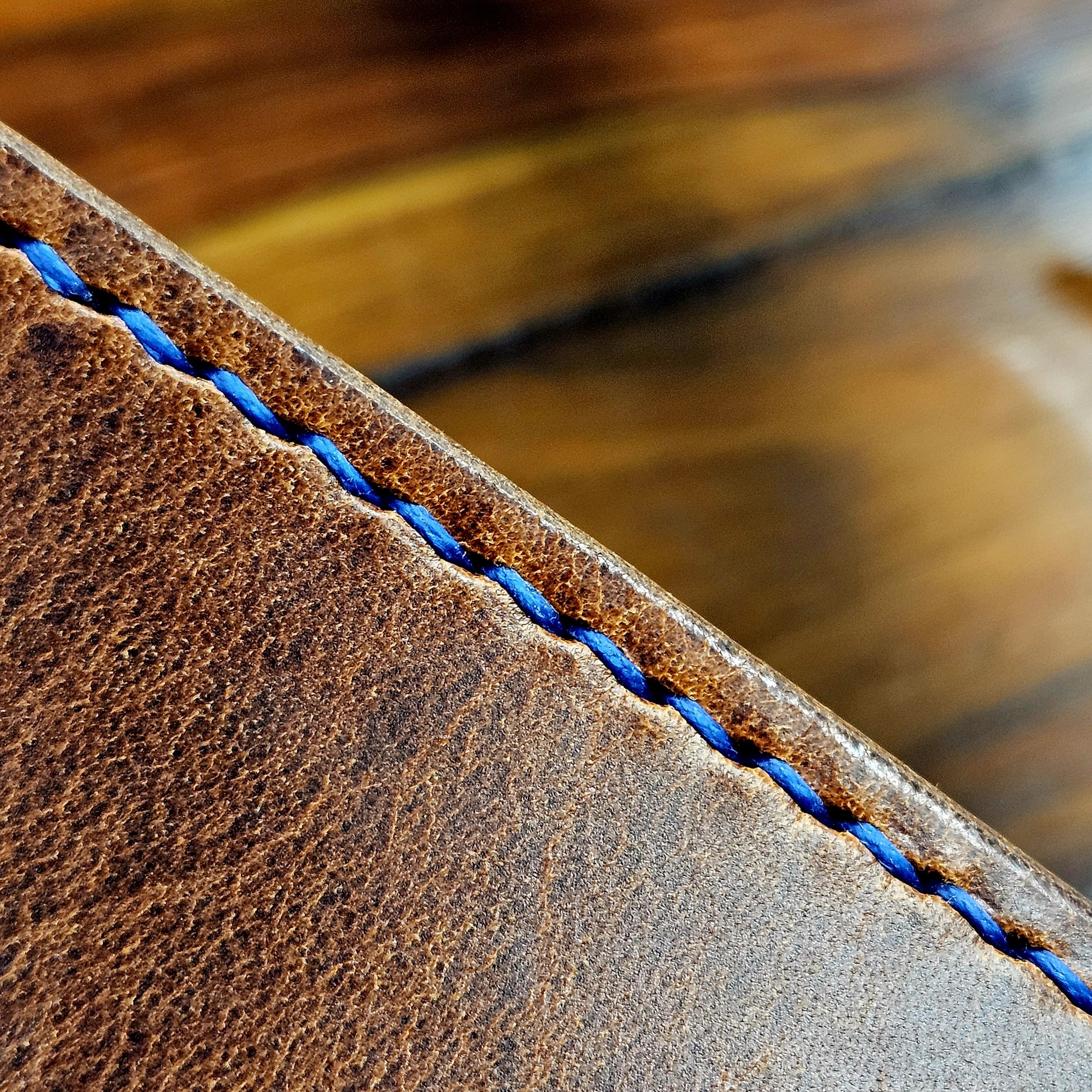 Hand made leather guitar strap. Hand stitched. Solid brass buckle. Made in UK.