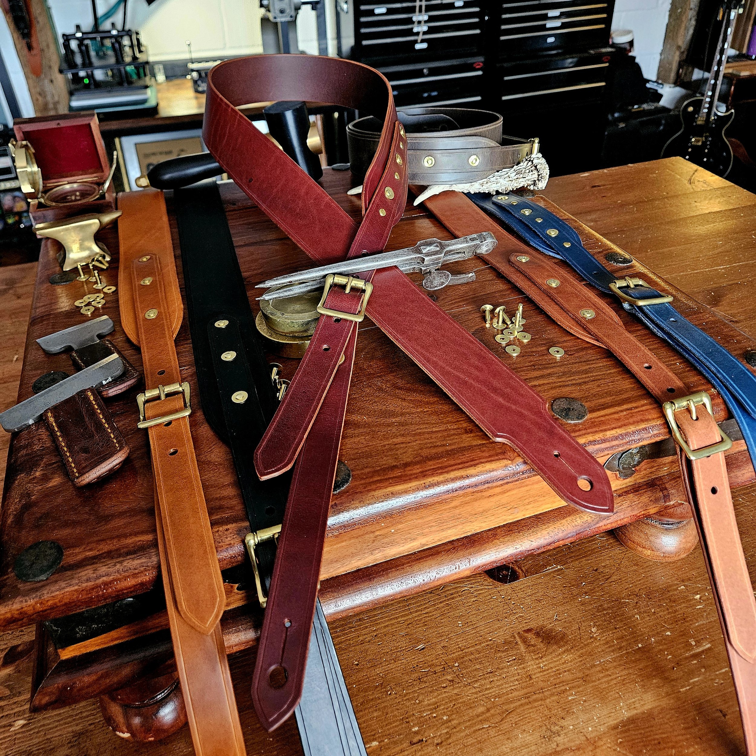 Hand made leather guitar strap. Solid Brass Buckle. Riveted. Made in UK.