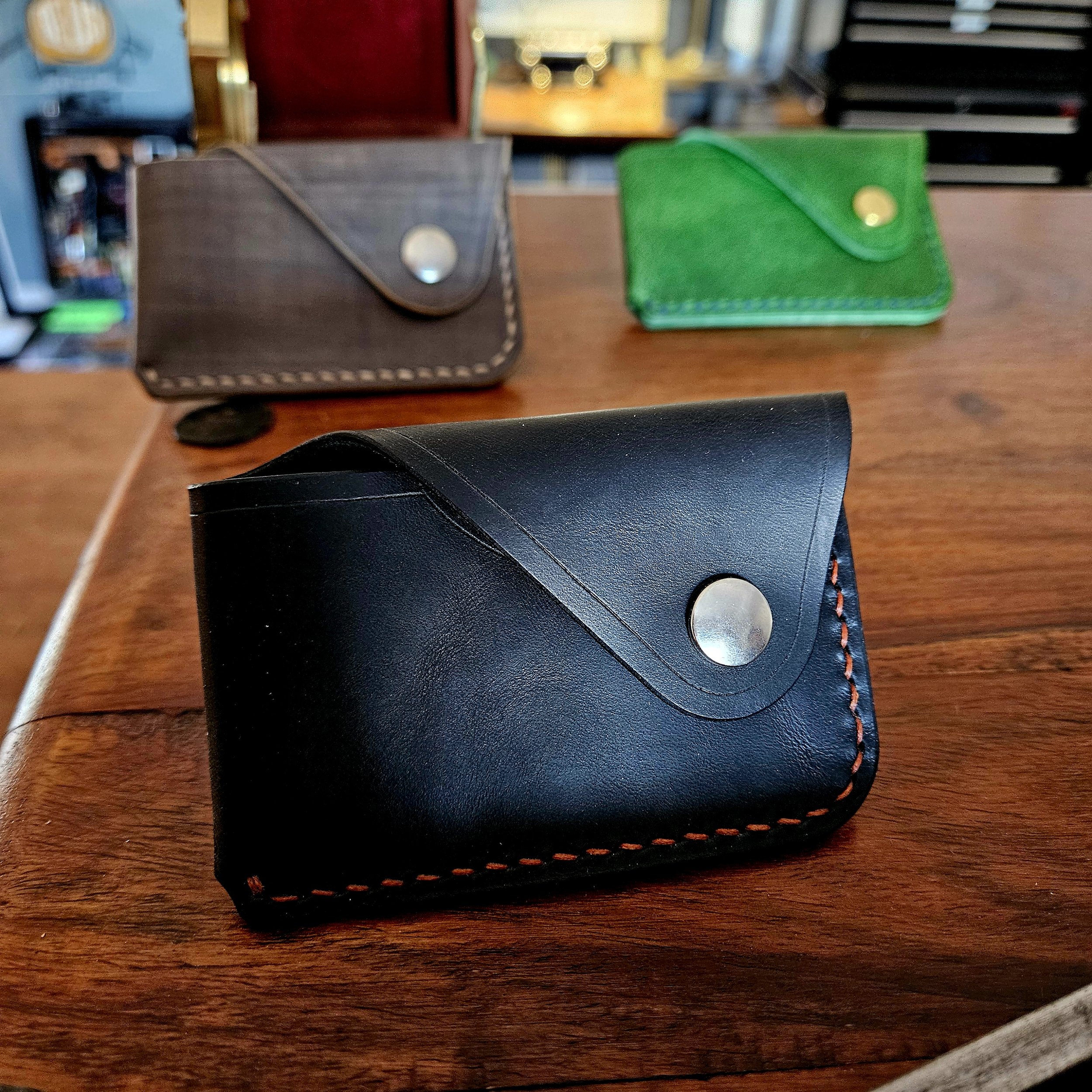 Hand stitched leather minimalist card wallet.