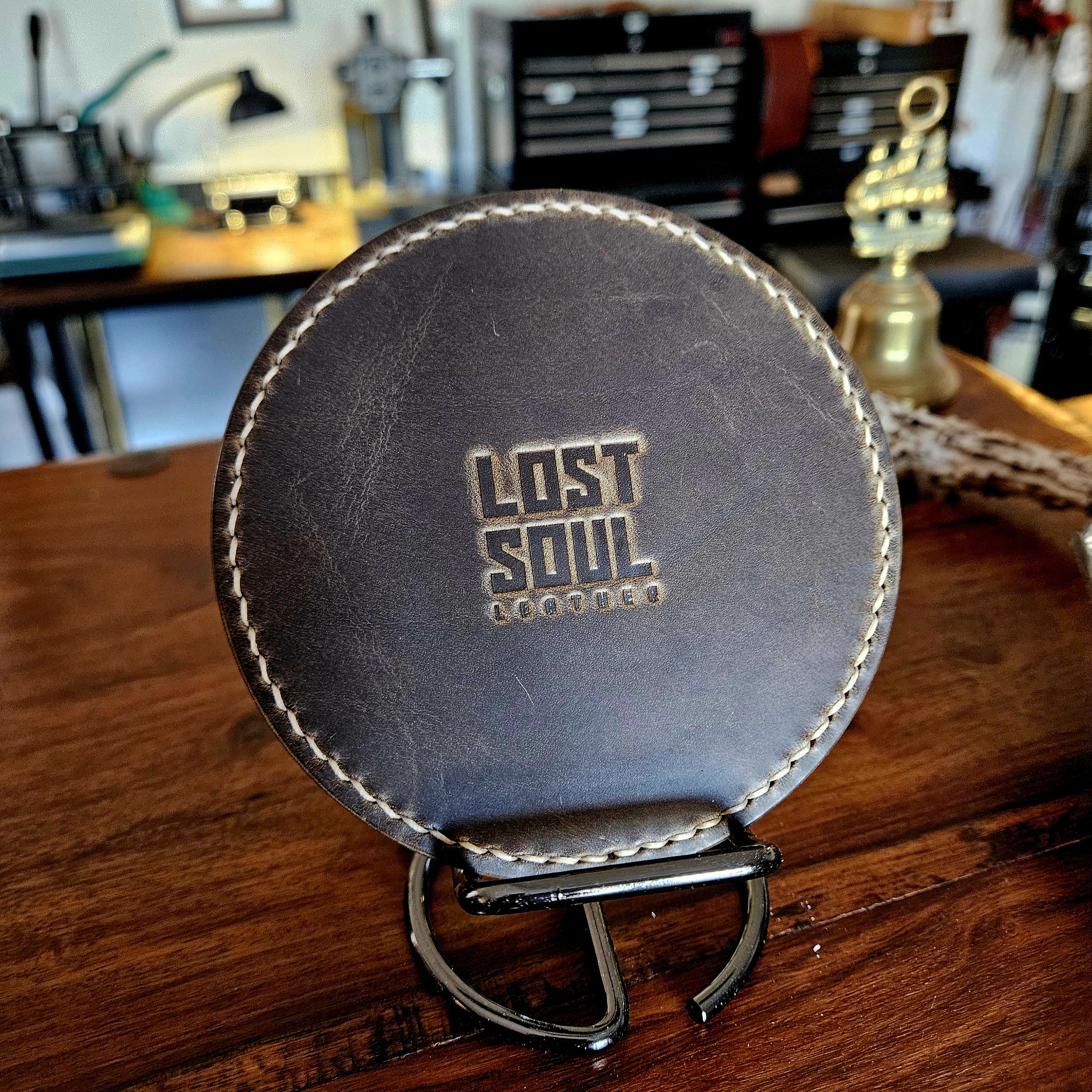 Hand stitched vegetable tanned leather coaster. Personalised.