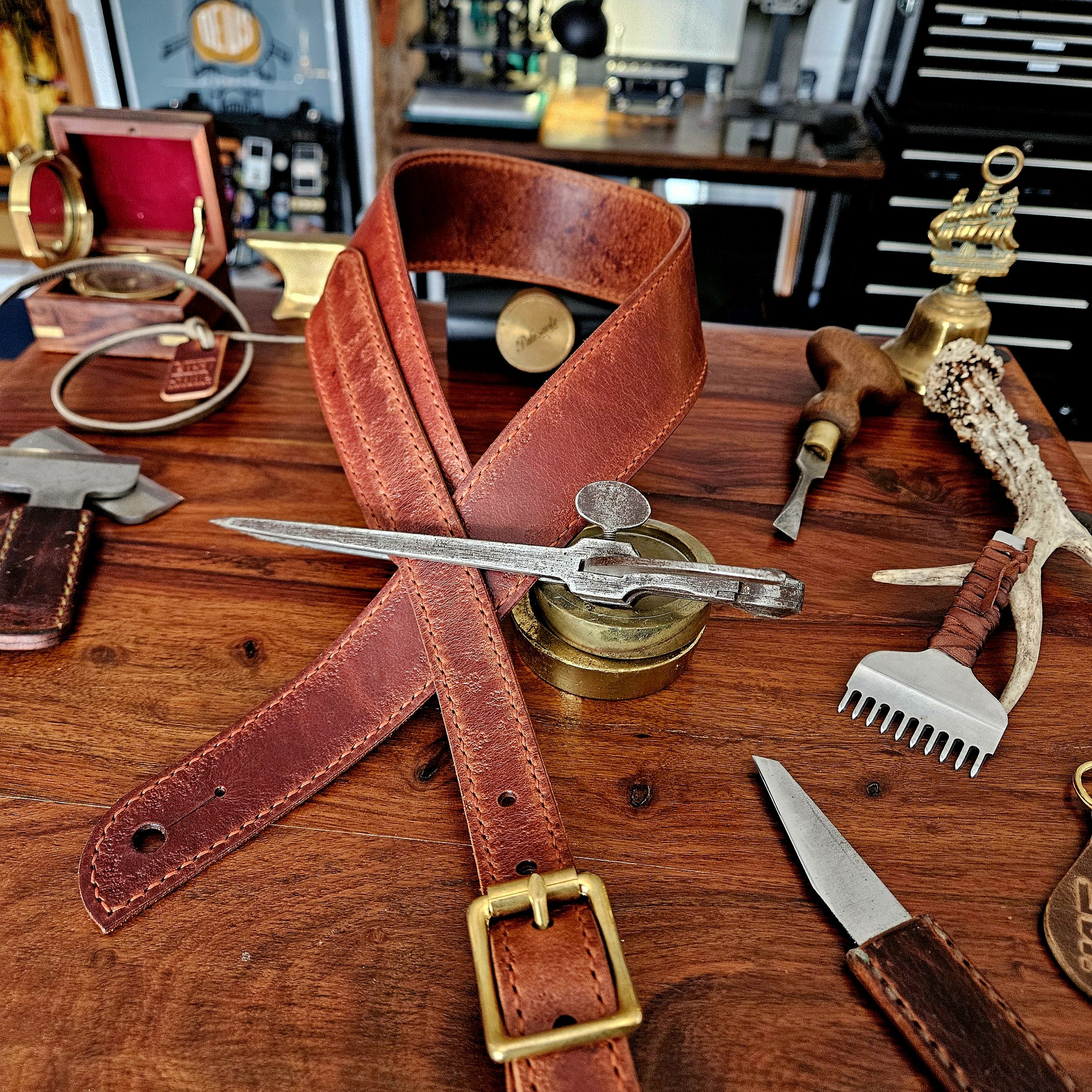 Hand made, hand stitched leather guitar strap. Highest quality UK sourced leather. Made to measure.