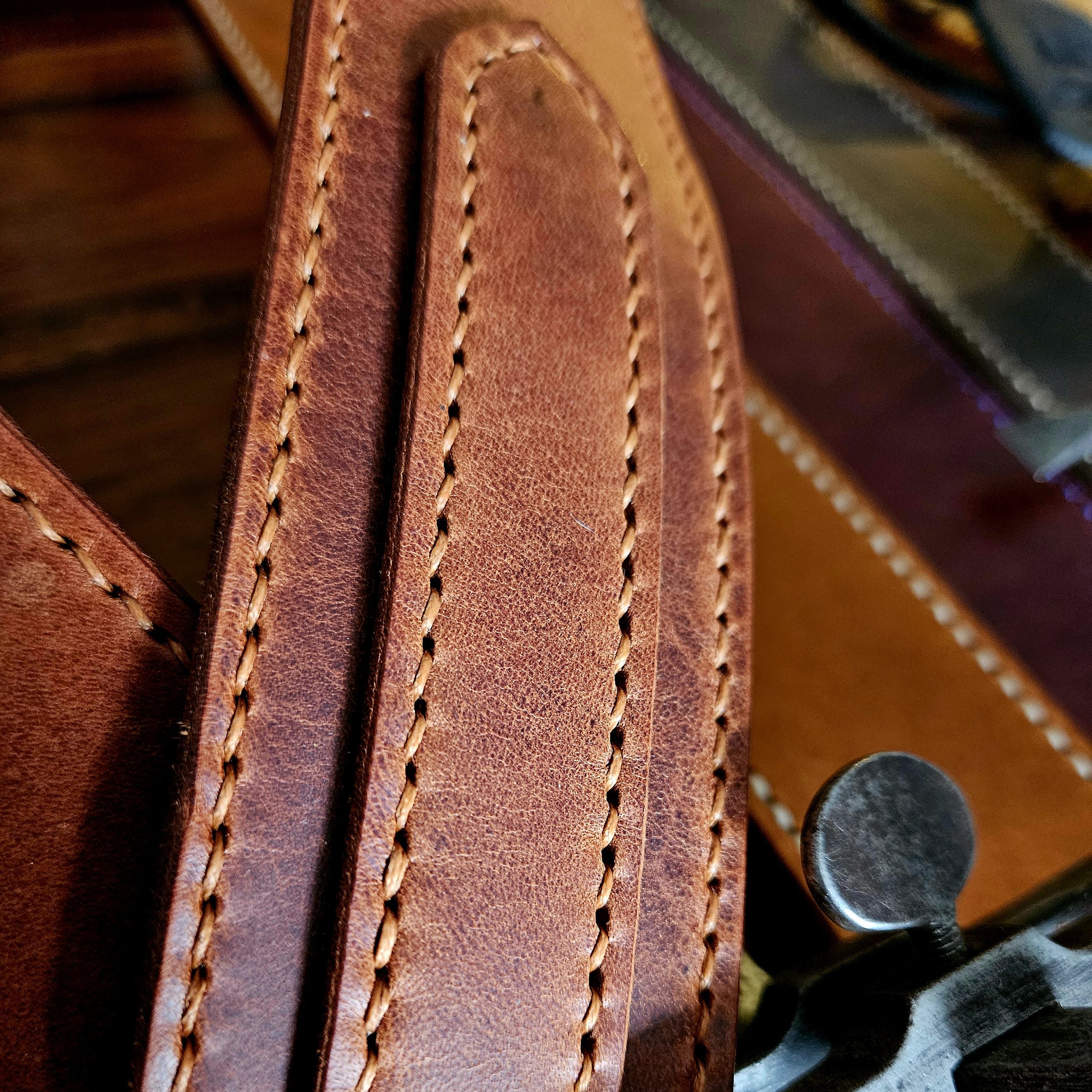 Hand made leather guitar strap. Hand stitched. Solid brass buckle. Made in UK.