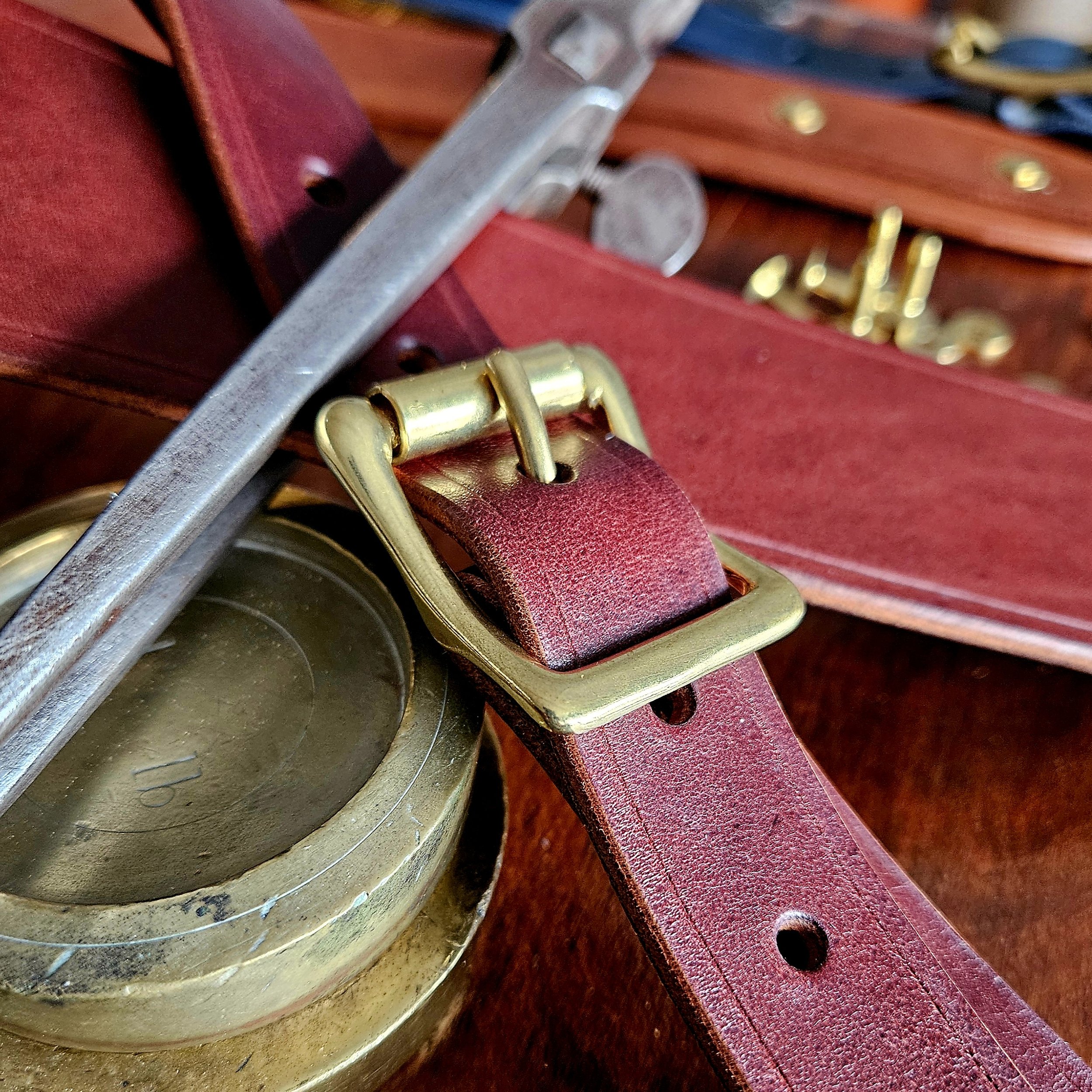 Hand made leather guitar strap. Solid Brass Buckle. Riveted. Made in UK.