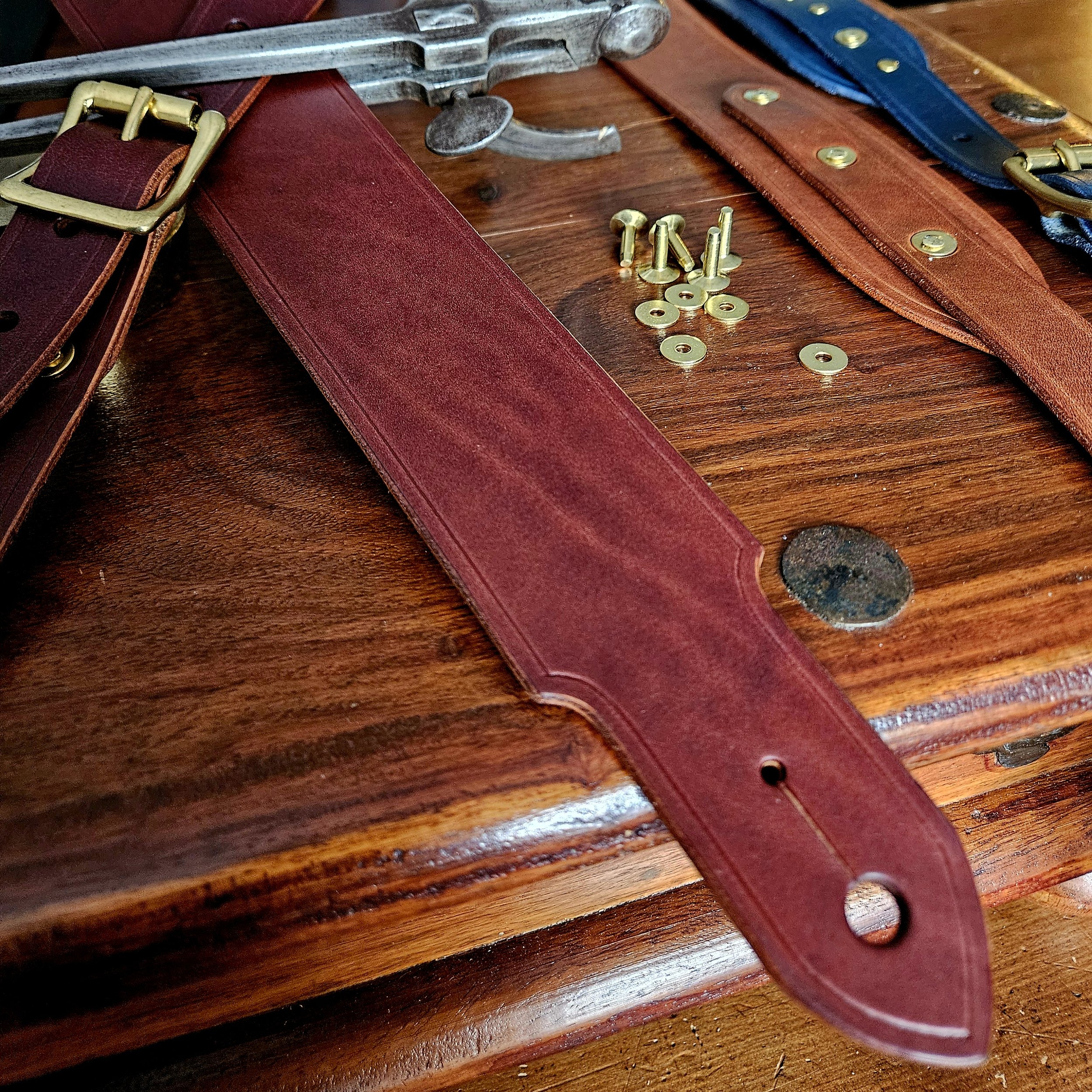 Hand made leather guitar strap. Solid Brass Buckle. Riveted. Made in UK.
